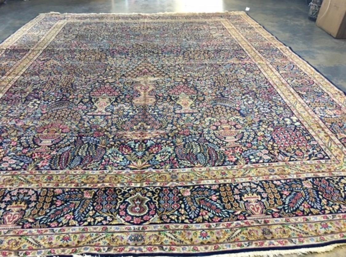Antique Persian Gold Navy Blue Ivory Floral Millefleur Kirman Rug In Good Condition For Sale In New York, NY