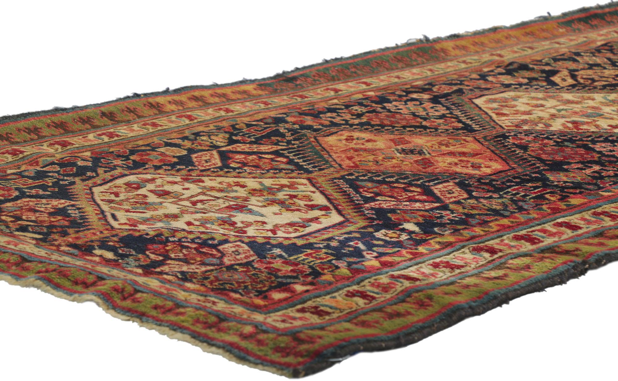 78195 antique Persian Northwest rug, 02'11 x 08'09. Rendered in variegated shades of navy blue, brick red, rust, green, sky blue, beige, berry, tan, cerulean, and pink with other accent colors. Desirable Age Wear. Abrash. Hand-knotted wool. Made in