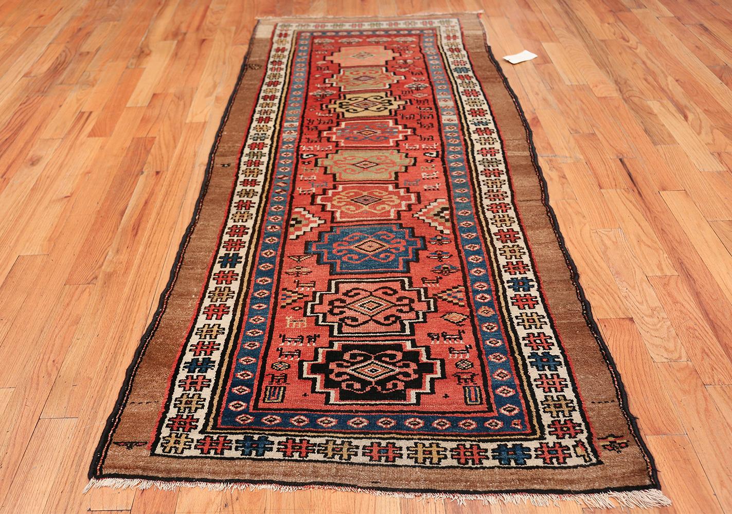 Antique Persian northwest rug, origin: Persia, circa 1920's. Size: 3 ft 6 in x 8 ft 4 in (1.07 m x 2.54 m)

Here is a an exciting and remarkable antique rug – an antique Northwest Persian carpet, woven in Persia during the second or third decade of