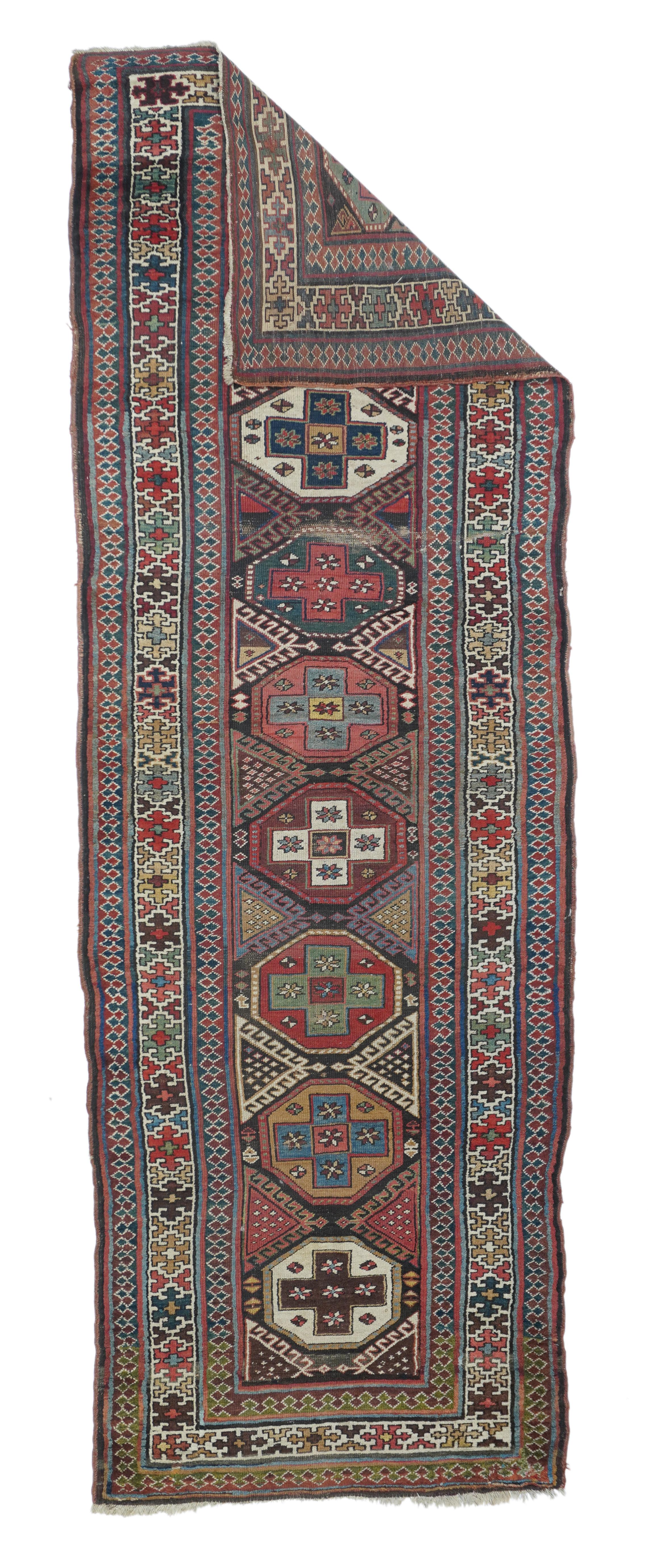 Antique Persian NW rug measures 3'8'' x 10'8''.