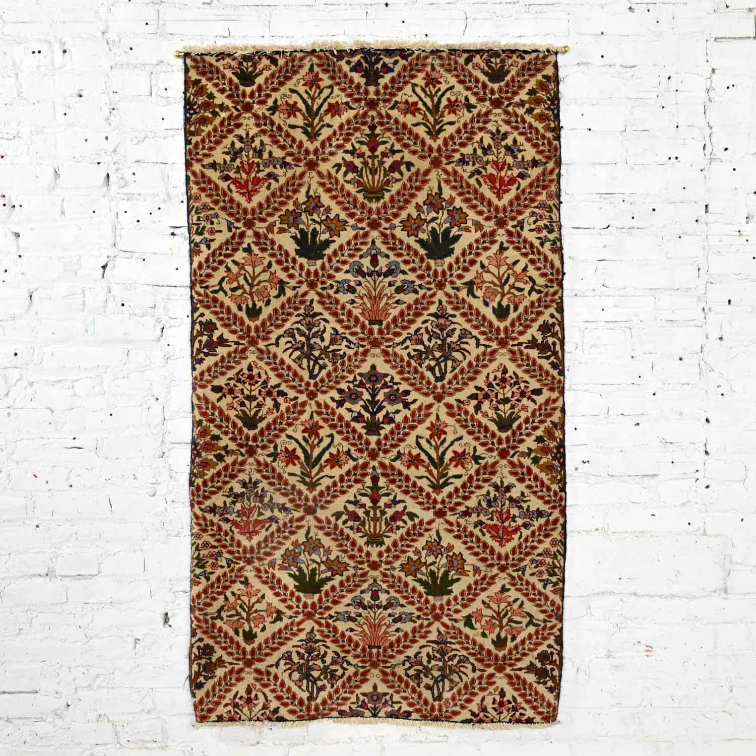 Antigua alfombra persa oriental tejida a mano en lana y algodón con hojas y flores para colgar en la pared