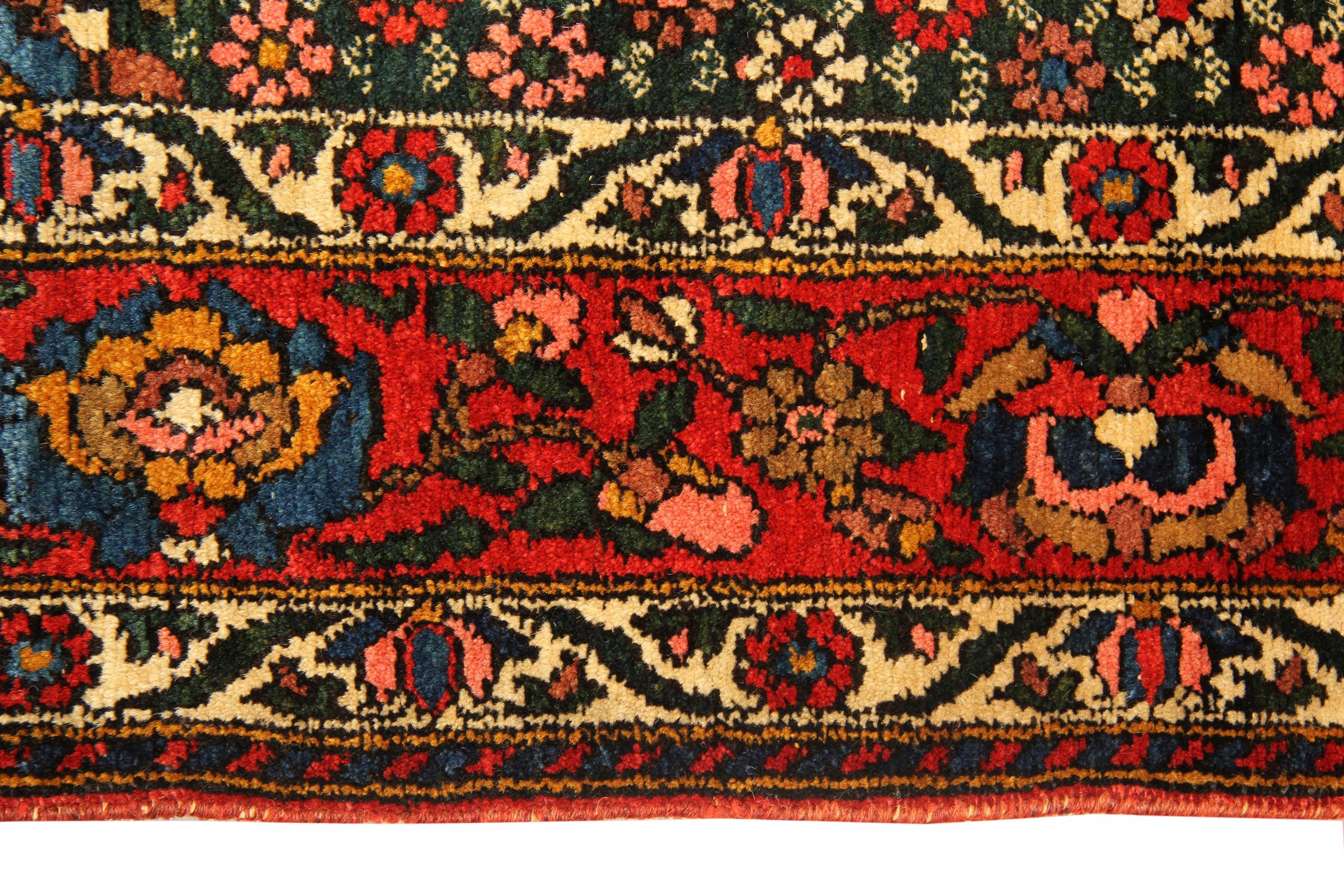 This is a beautiful example of the 19th century antique Persian Baktiyar rugs with a bold medallion on an 