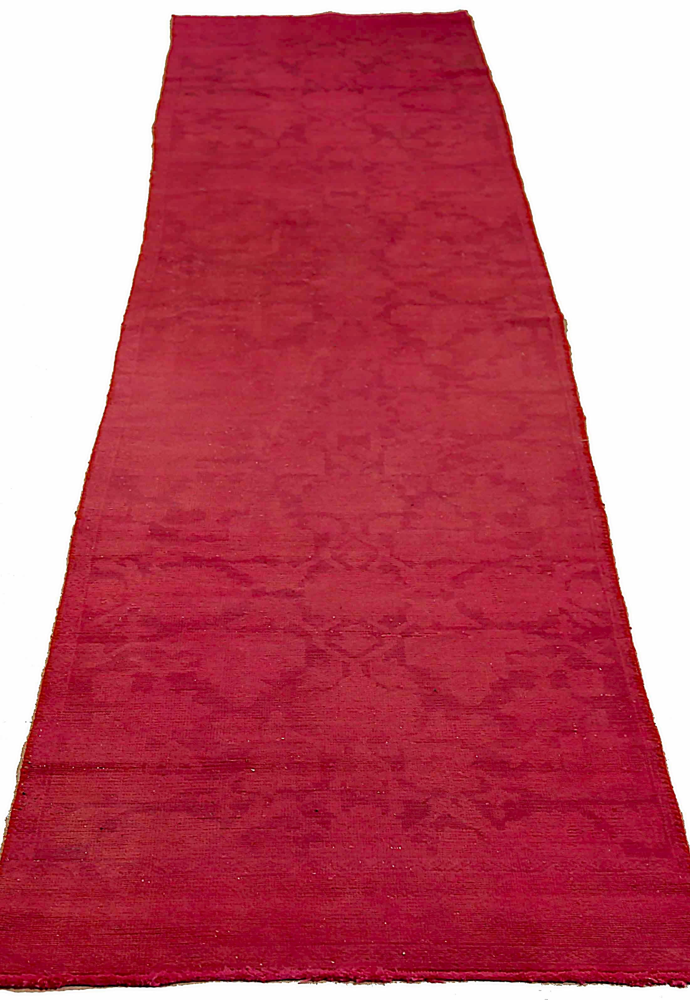 Antique handmade Persian area rug from high quality sheep’s wool and colored with eco-friendly vegetable dyes that are proven safe for humans and pets alike. It’s a Classic Overdye design showcasing a pink field with prominent Herati flower heads