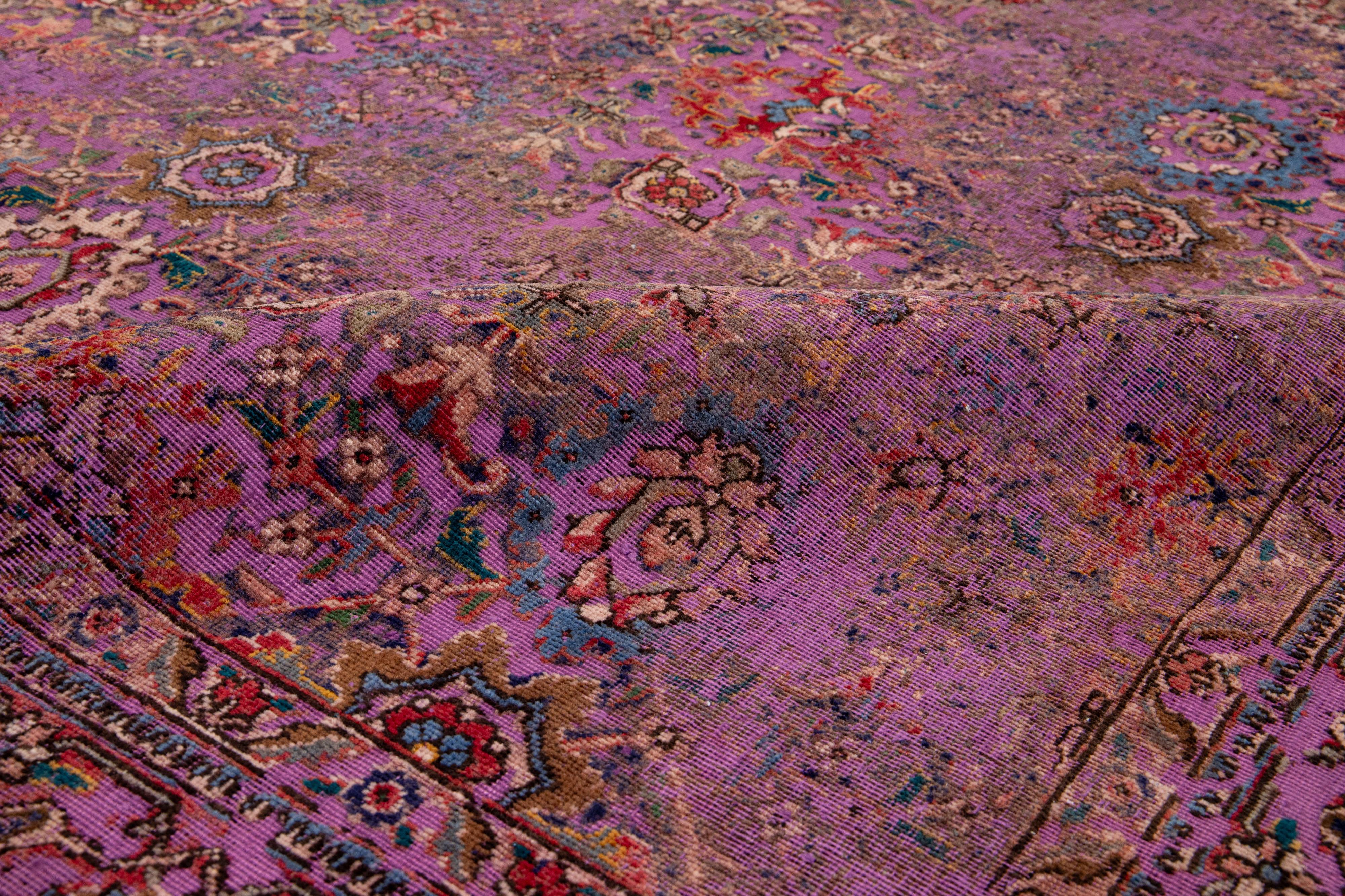 Hand-Knotted Antique Persian Overdyed Wool Rug With Floral Pattern In Purple For Sale