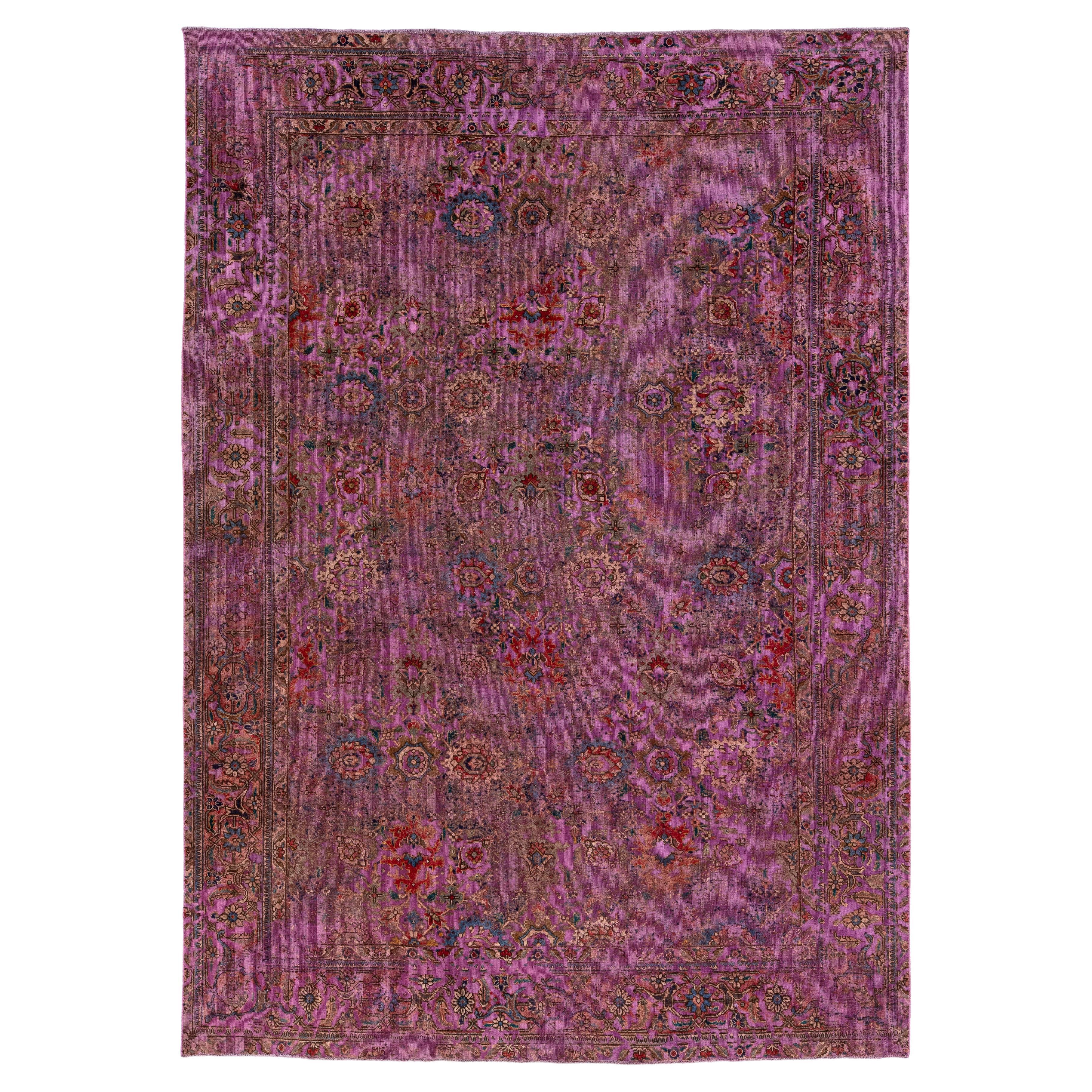 Antique Persian Overdyed Wool Rug With Floral Pattern In Purple For Sale