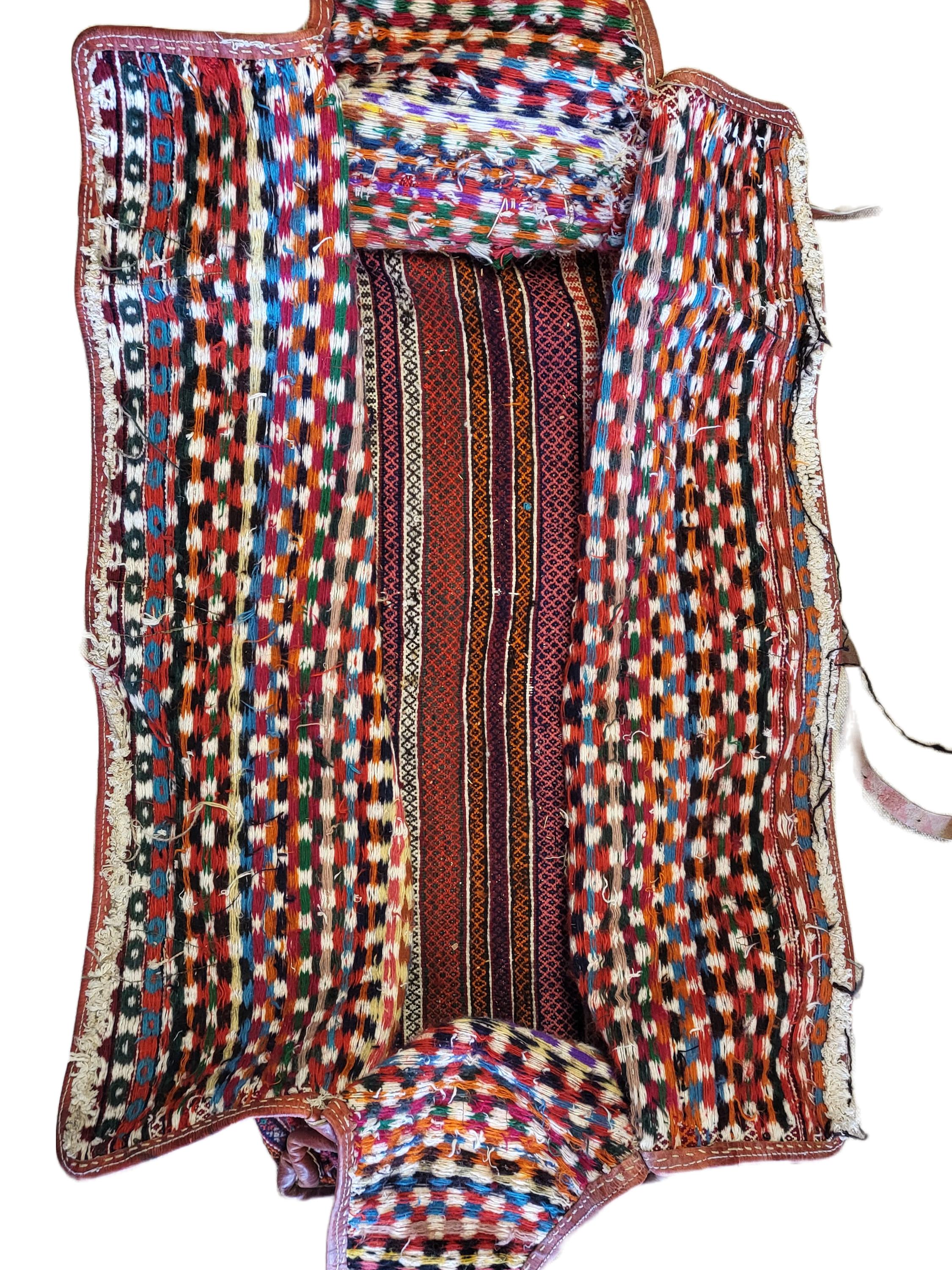 Stunning Persian Qashqai Nomadic Bag

Beautiful piece of Persian heritage, handcrafted by the legendary nomads The Qashqais. This intricate and funtional piece of art took about a year to make. The Qashqais are master craftsman and reflect their