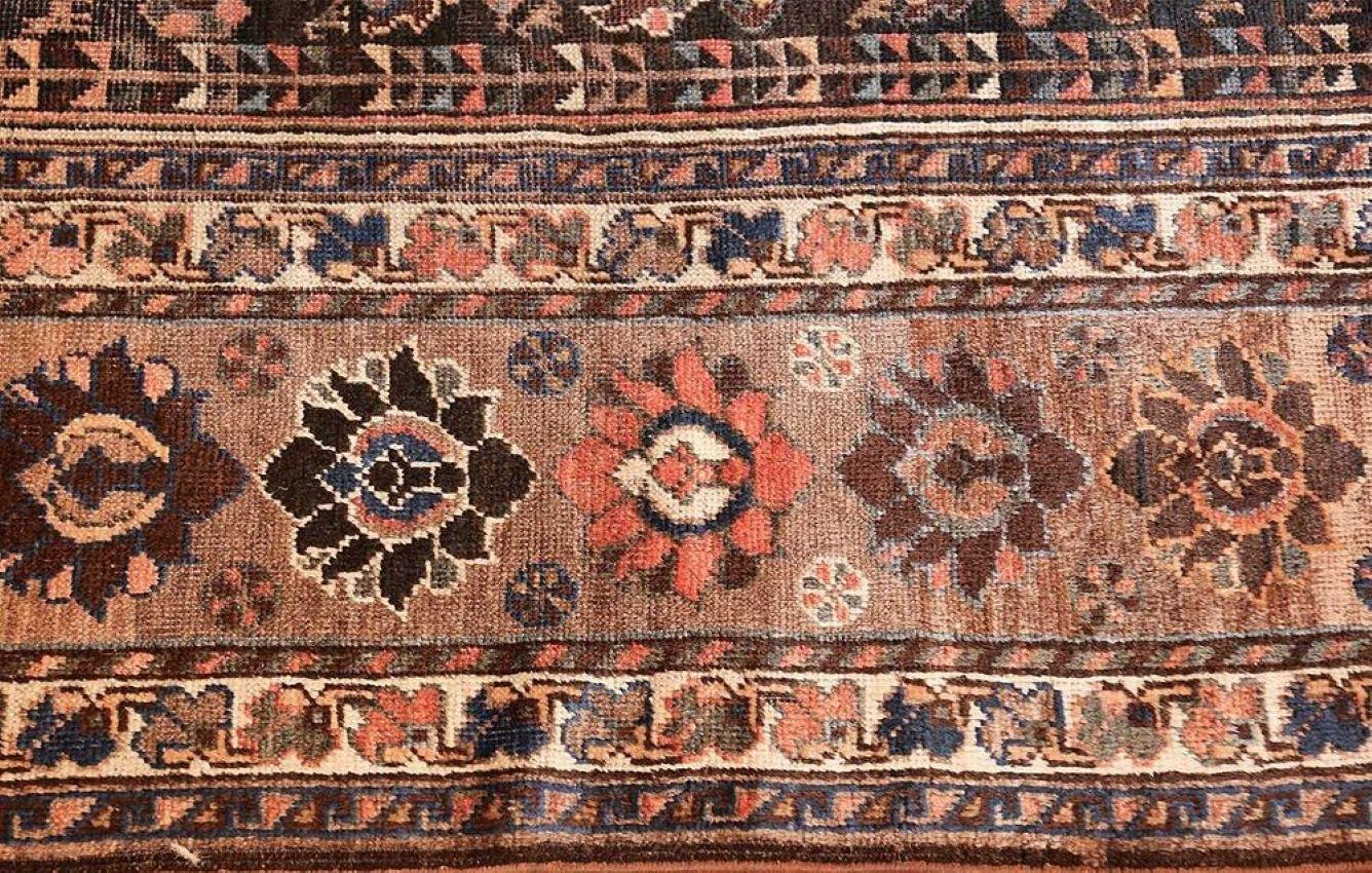 Antique Persian Qashqai gallery size rug, 16 ft 8 in x 7 ft (5.08 m x 2.13 m). Circa 1920's. Overall very good condition. Good pile with minor areas slightly lower in pile. Minor corrosion to browns. Sides are re-bound. Both ends stabilized. Carpet