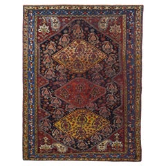 Antique Persian Qashqai Rug 5'1" x 7’1"