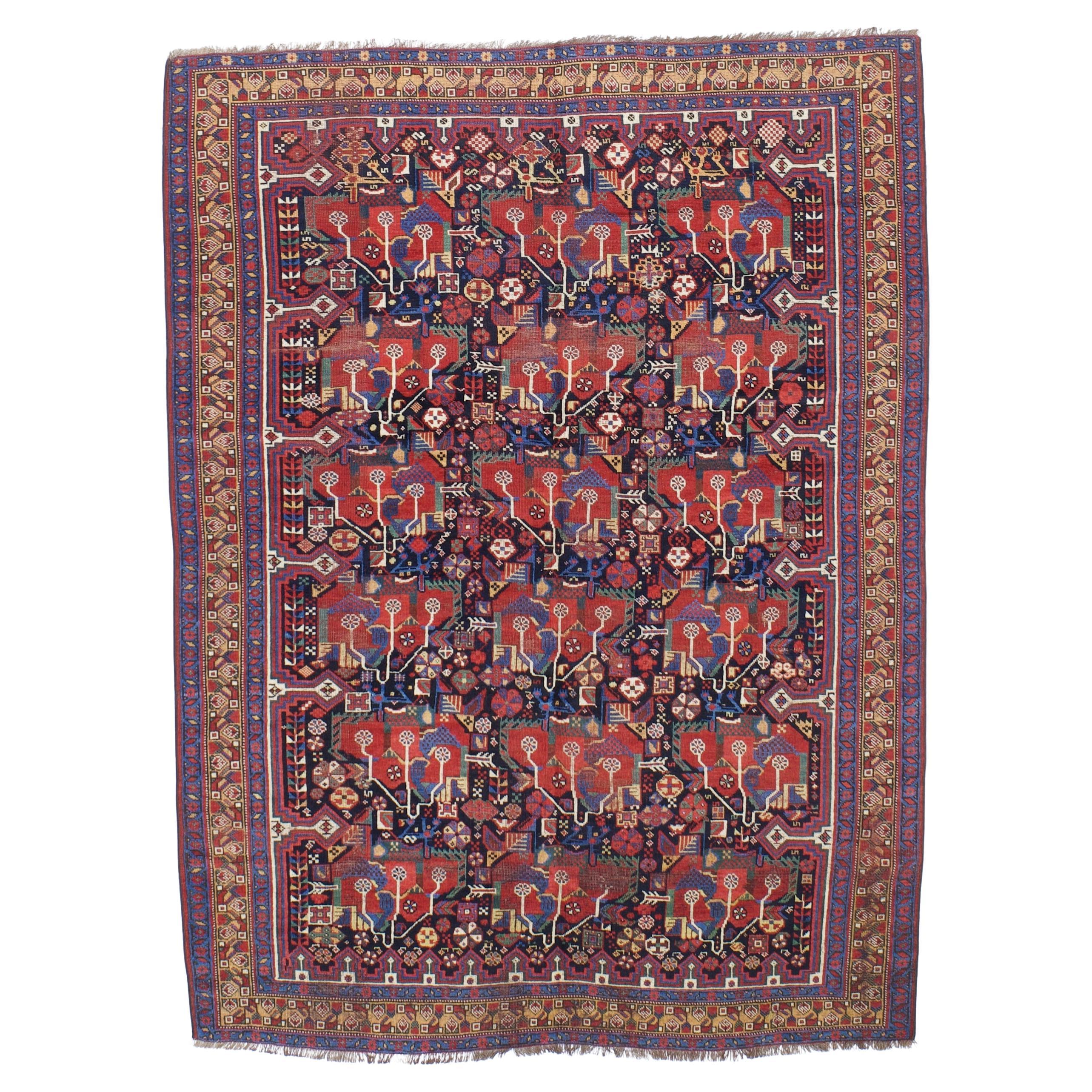 Antique Persian Qashqai Rug 5'3" x 7’1"