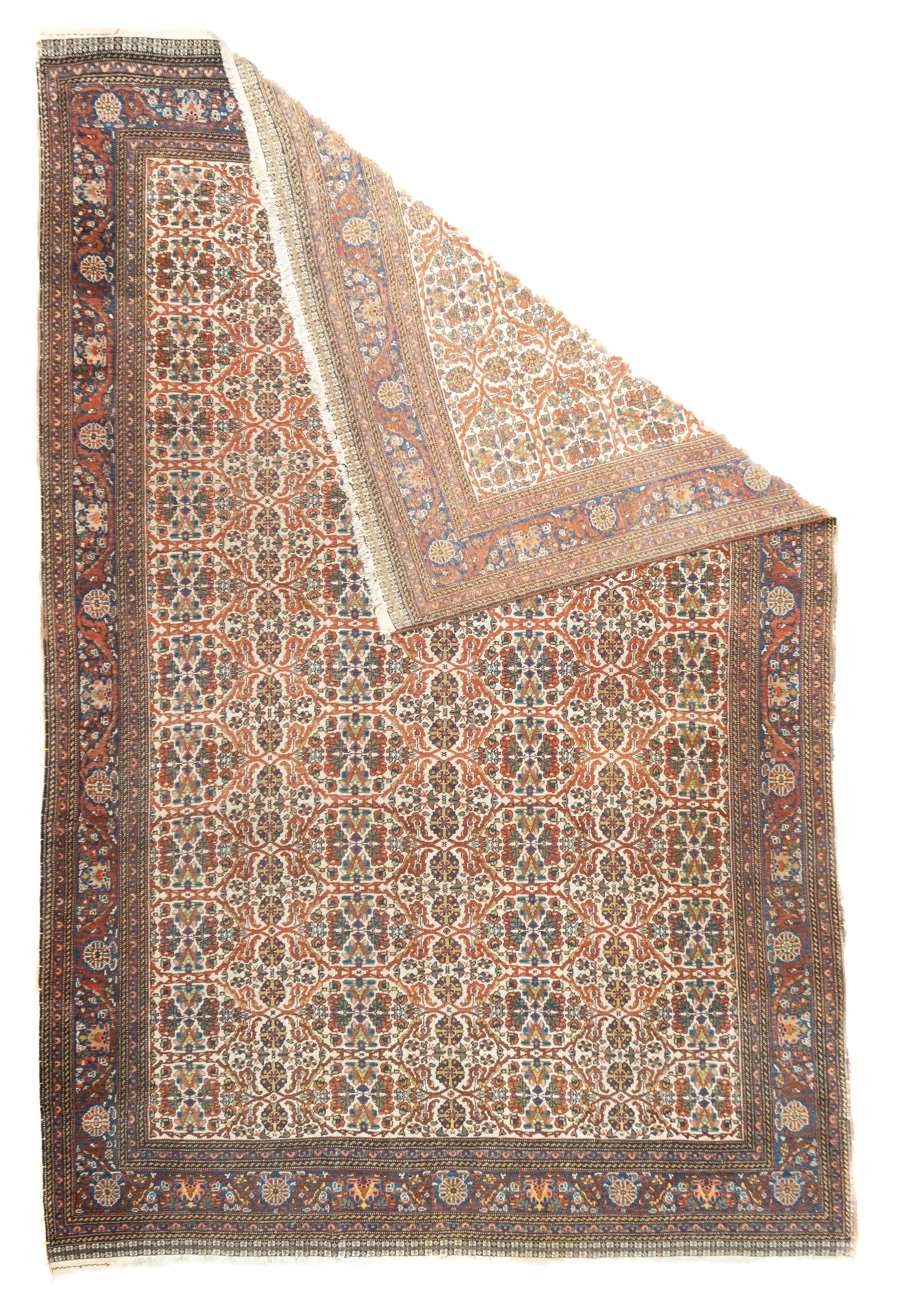Antique Persian Qashqai Rug 6'11'' x 10'6''. This well-woven Qashghai tribal piece features an ecru ground minutely patterned with a textile repeat of rosettes, broken and curved stems and tiny millefleurs elements. Near black border with similar