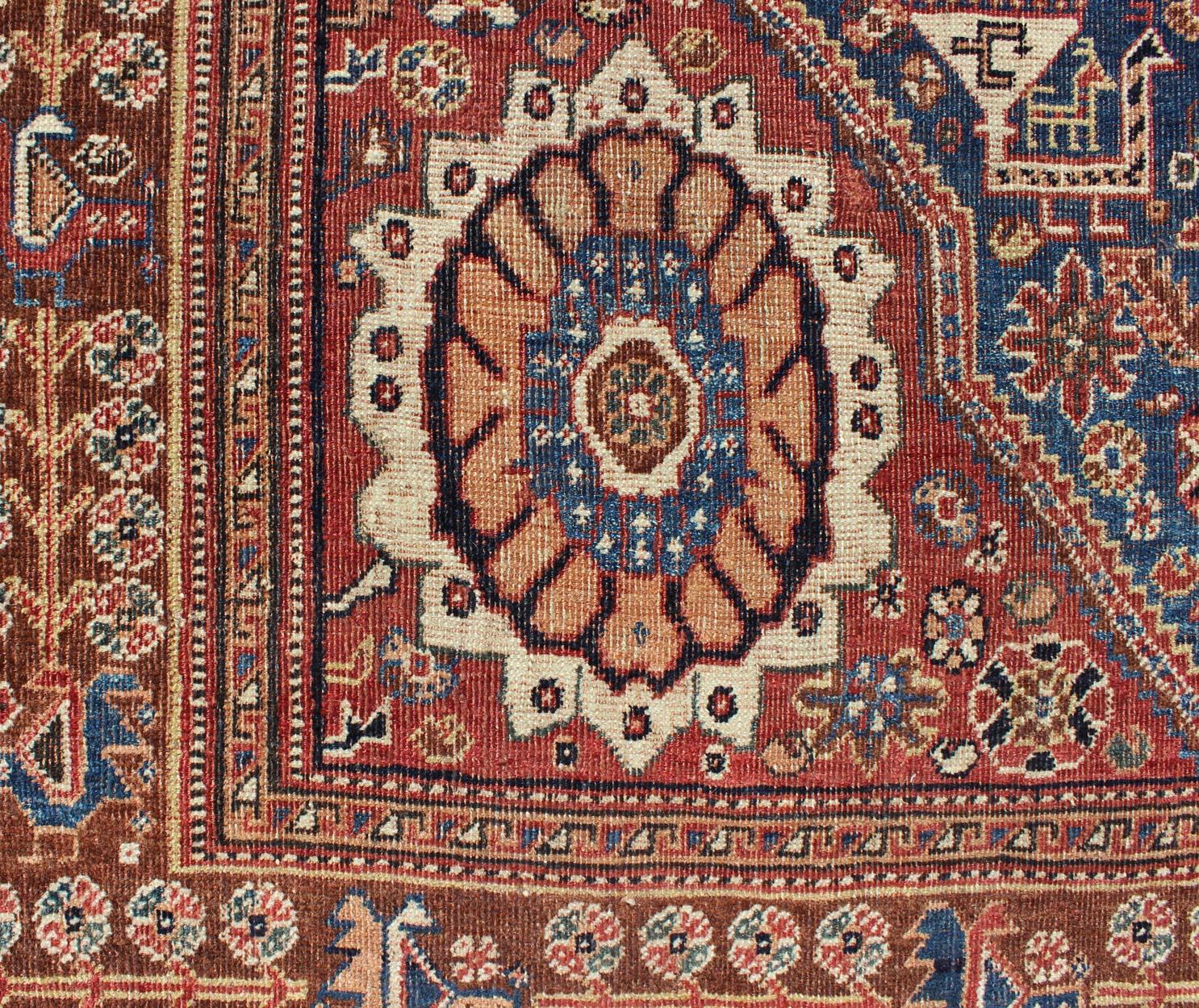 Hand-Knotted Antique Persian Qashqai Rug with Central Medallion in Ink Blue and Faded Red For Sale