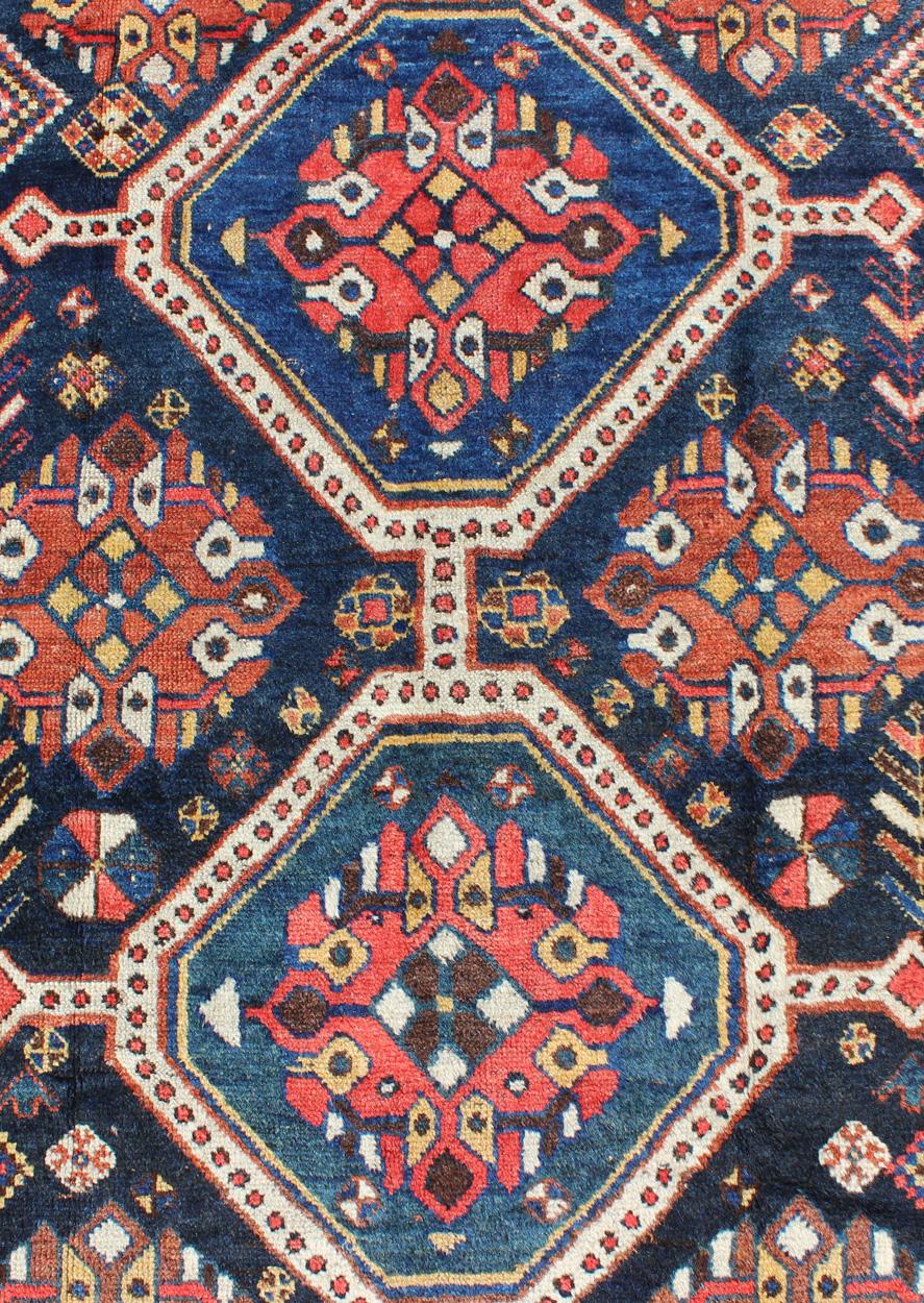 Antique Persian Qashqai Rug with Four-Medallion Design in Blue, Red, Brown Tones For Sale 3