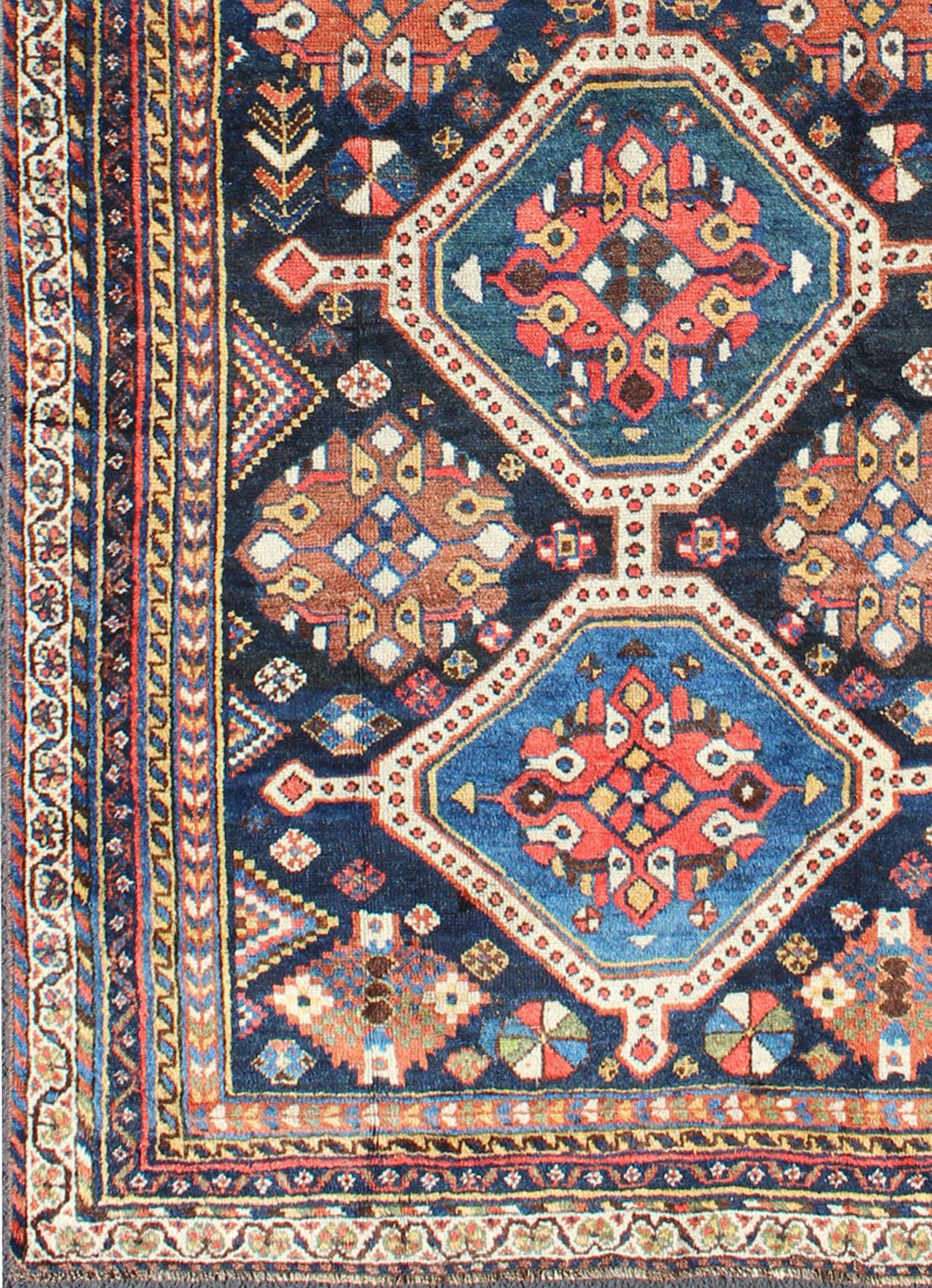 Tribal Qashqai Gallery rug from Persia with geometric designs in multi-colors, rug ema-7551, country of origin / type: Iran / Qashqai, circa 1910.

The Qashqai nomads are found in the Fars province in southwest Iran. They move twice a year, between
