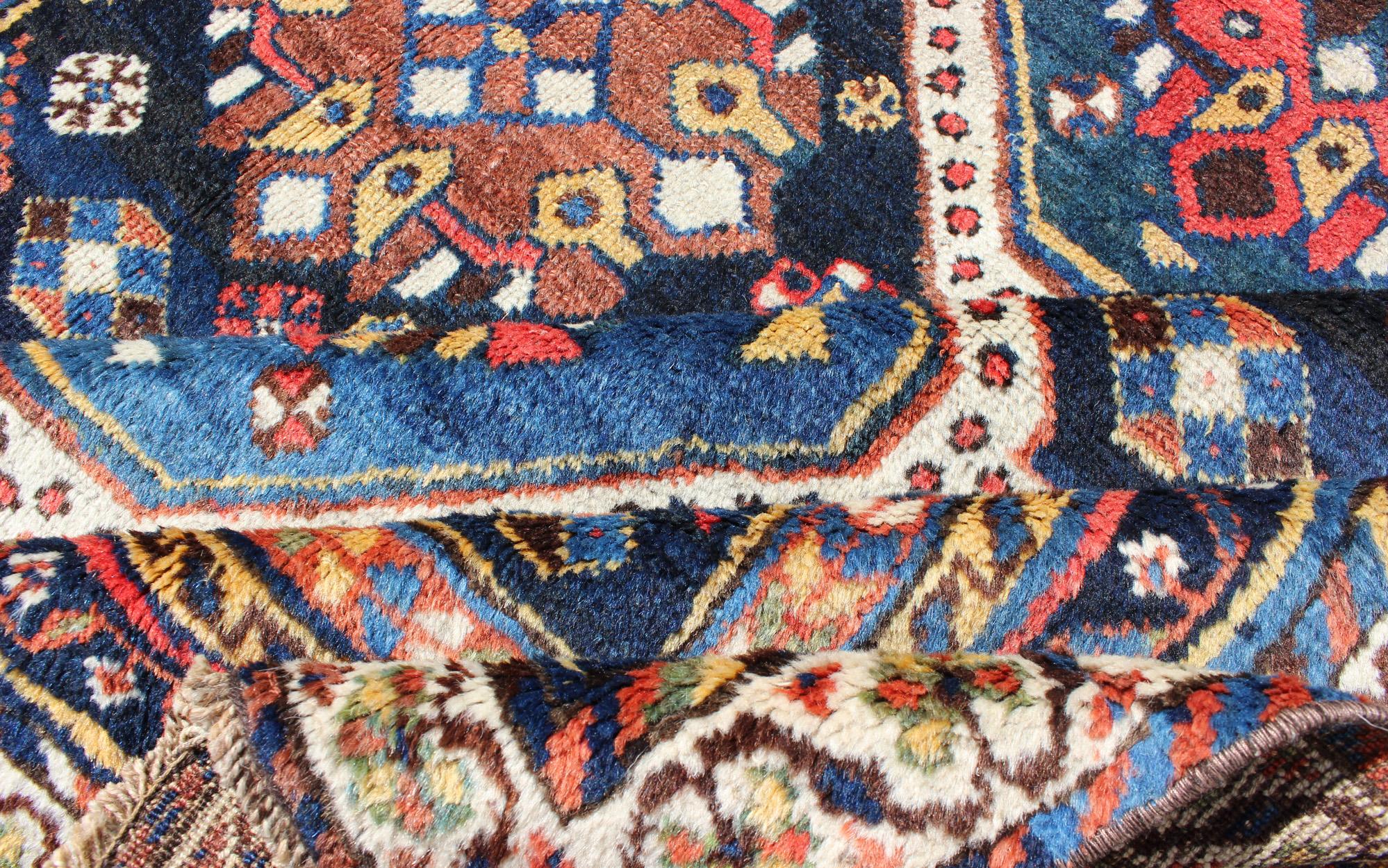 Antique Persian Qashqai Rug with Four-Medallion Design in Blue, Red, Brown Tones In Good Condition For Sale In Atlanta, GA