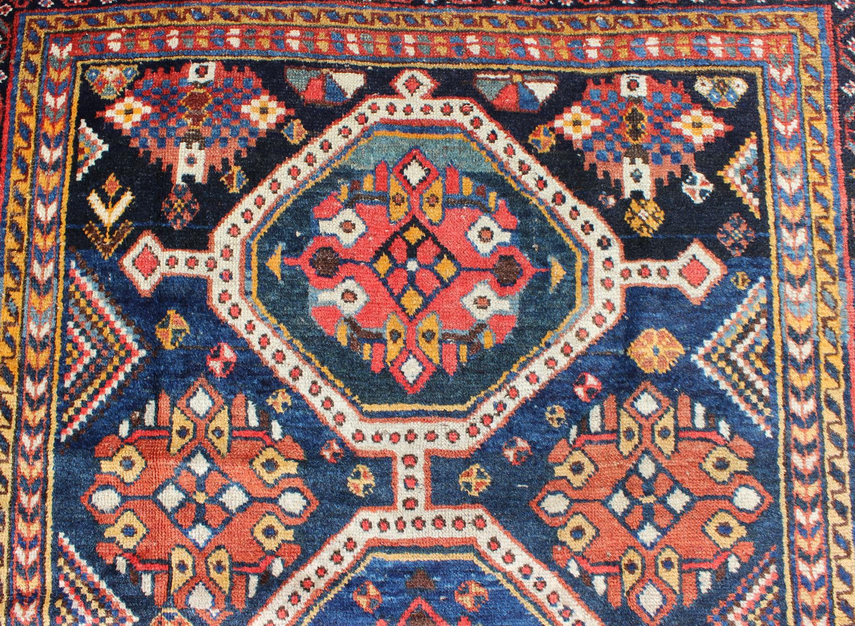 Early 20th Century Antique Persian Qashqai Rug with Four-Medallion Design in Blue, Red, Brown Tones For Sale