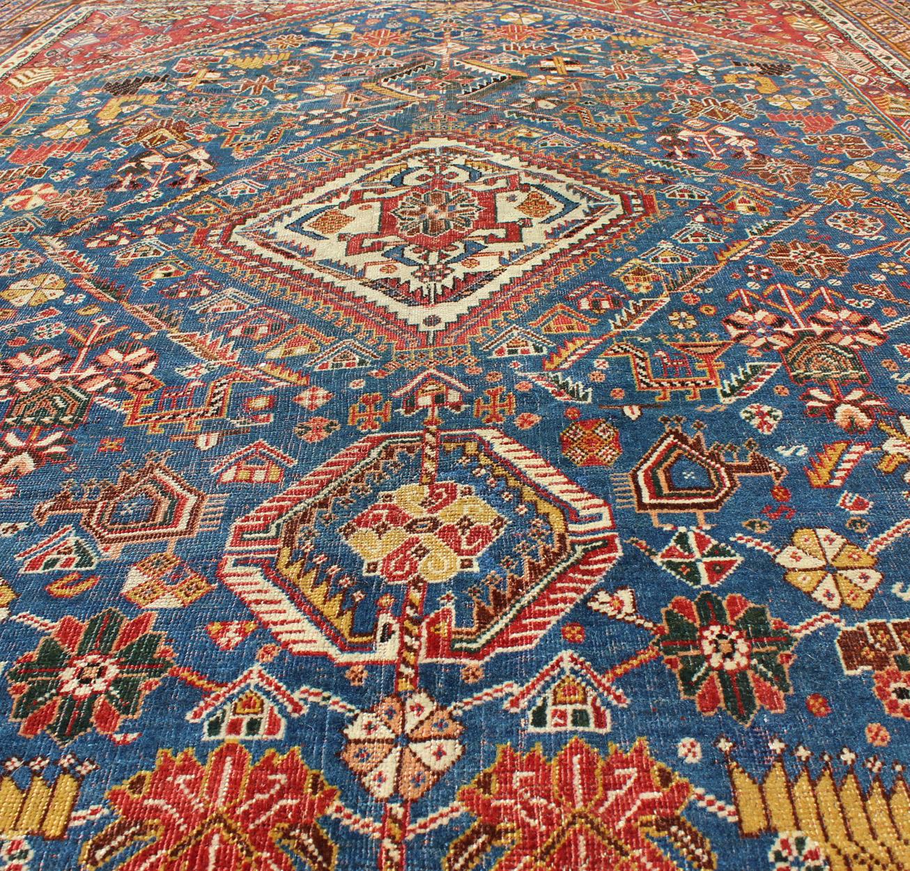 Wool Antique Persian Qashqai Rug with Medallion Design in Rich Colors, Blue and Red