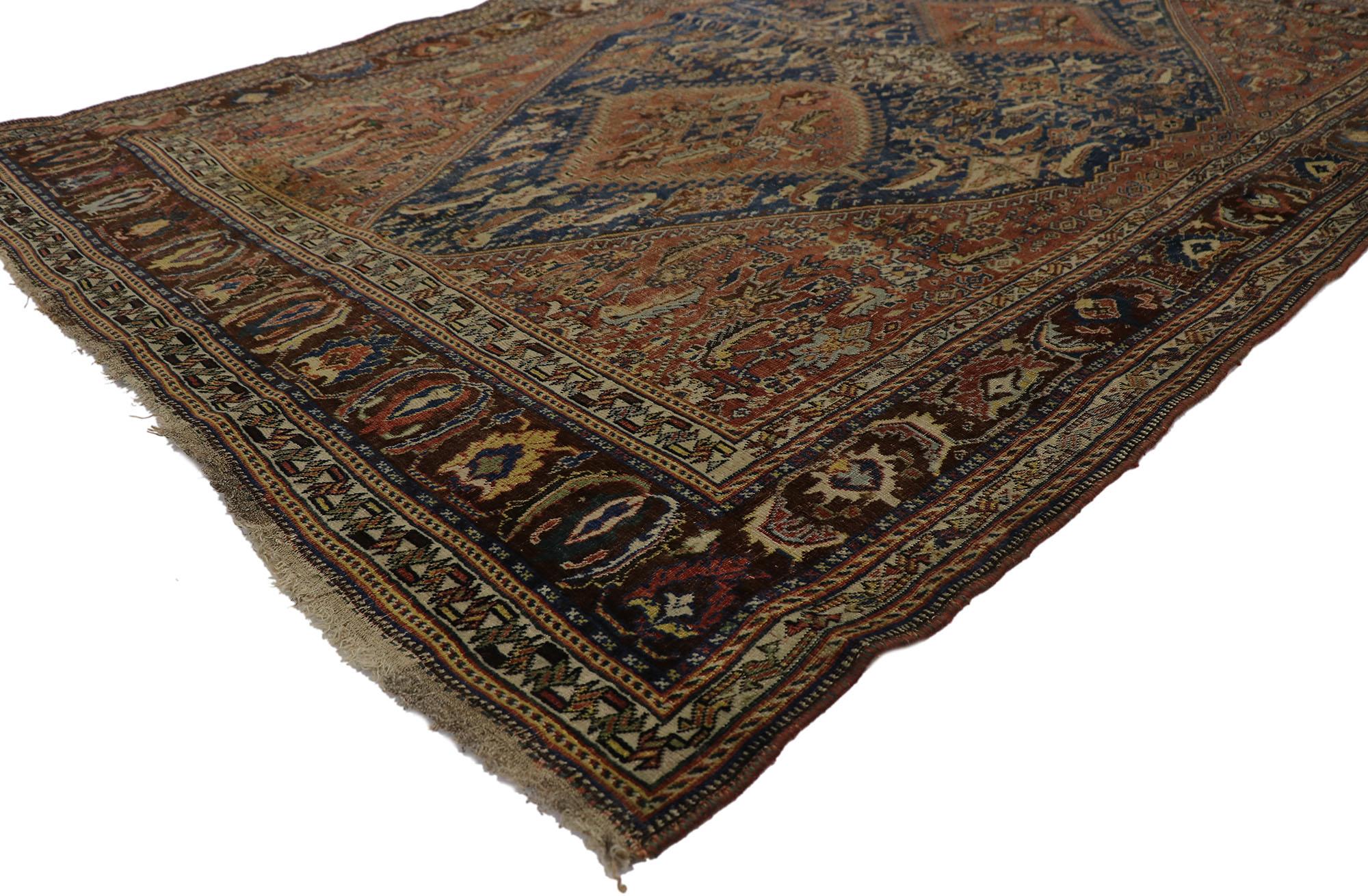 21696 Antique Persian Qashqai Rug 05'00 x 07'06. Rendered in variegated shades of rust, brick red, terra cotta, navy blue, brown, sienna, tan, taupe, ecru, sand, sky blue, oxblood red, and green with other accent colors. 

Distressed. Desirable