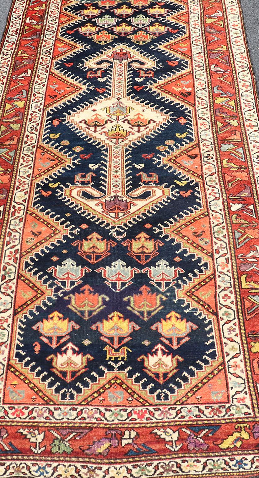 Antique Persian Qashqai Runner with Geometric Medallion Design in Vivid Colors  For Sale 4