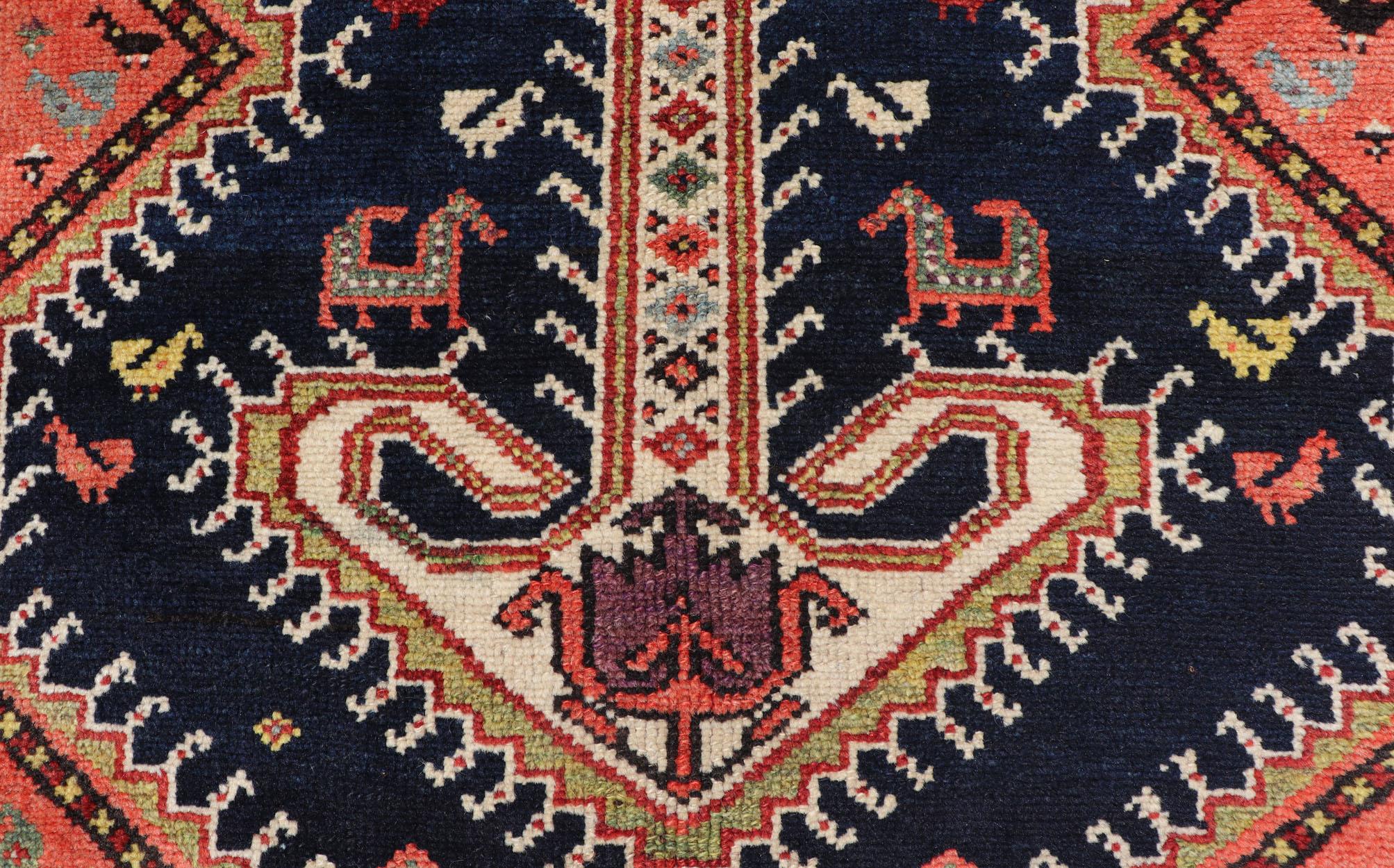 20th Century Antique Persian Qashqai Runner with Geometric Medallion Design in Vivid Colors  For Sale