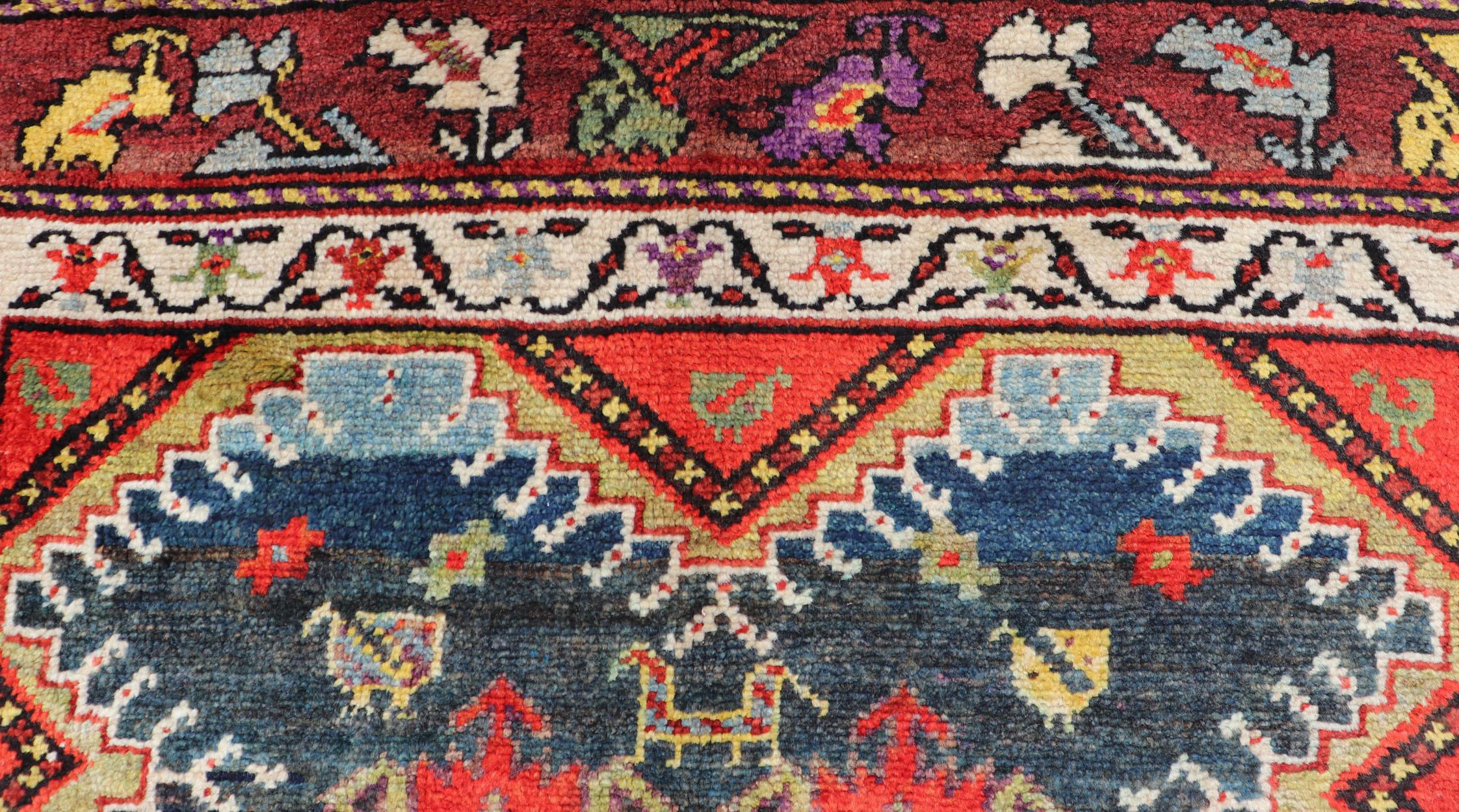 Antique Persian Qashqai Runner with Geometric Medallion Design in Vivid Colors  For Sale 1