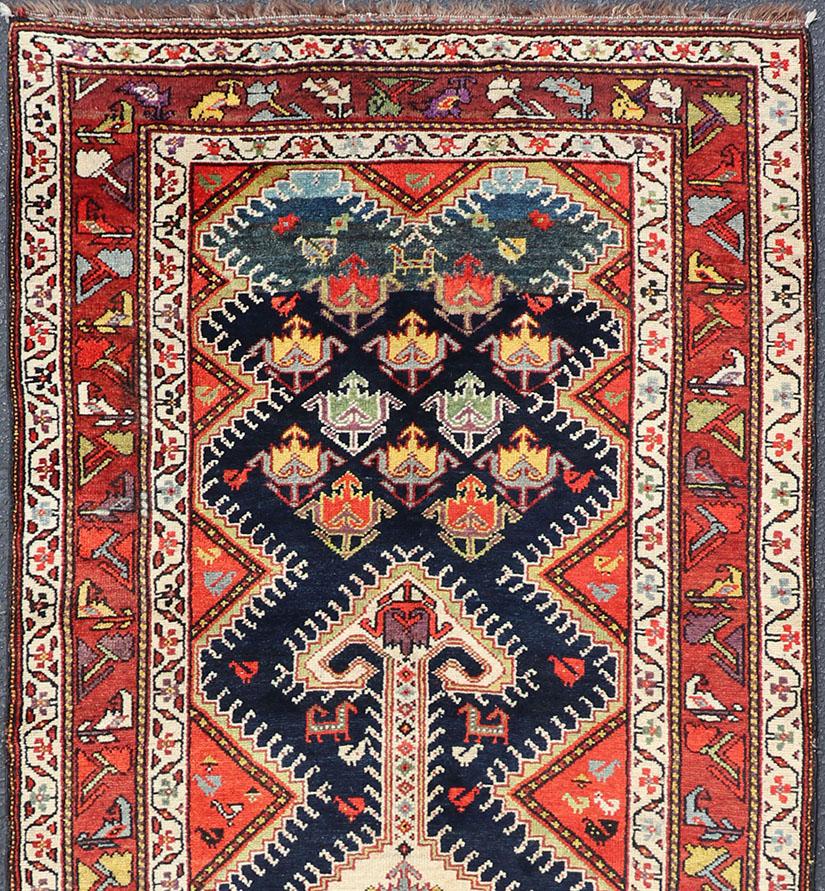 Antique Persian Qashqai Runner with Geometric Medallion Design in Vivid Colors  For Sale 2