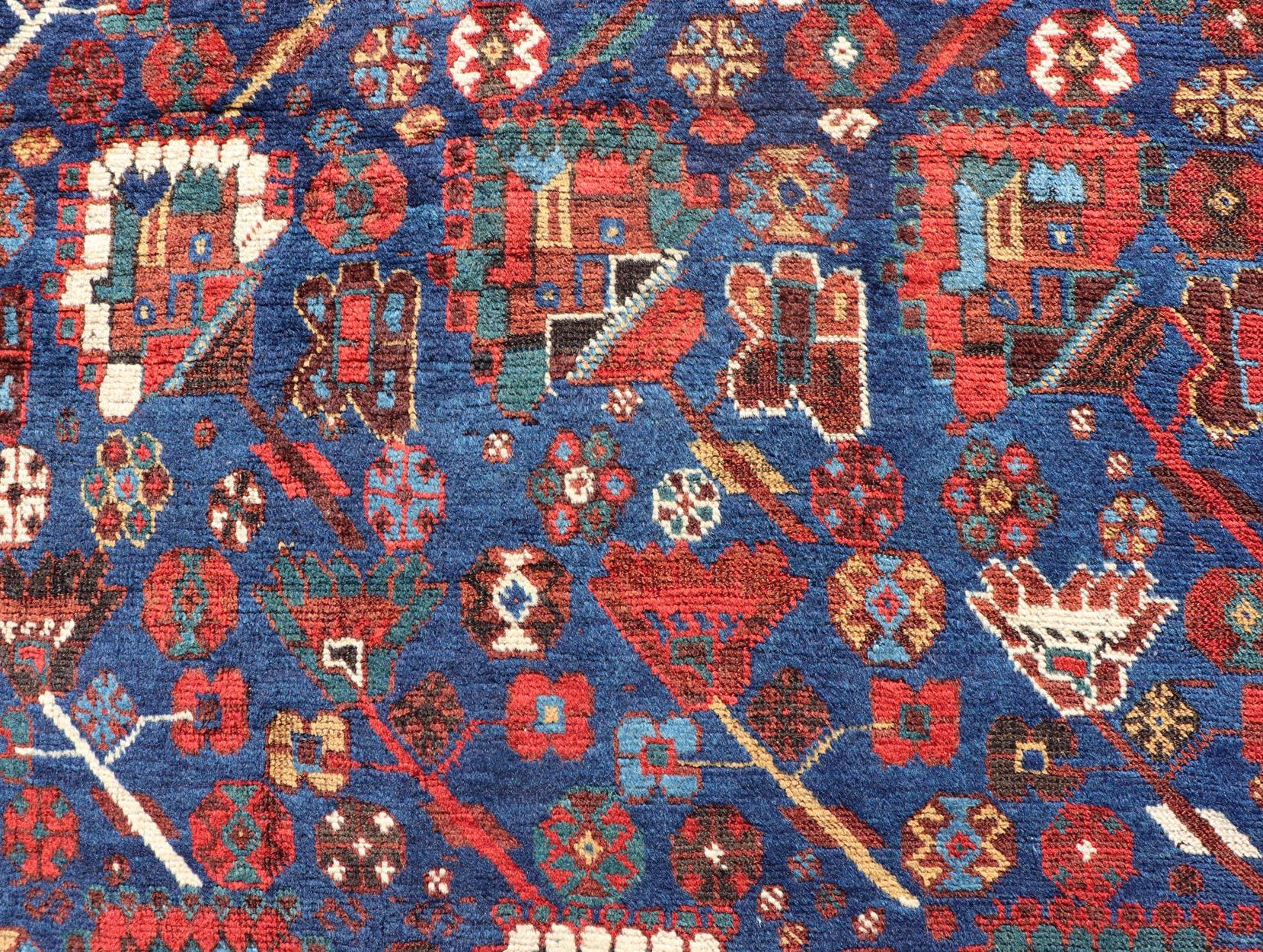 Hand-Knotted Antique Persian Qashqai Shiraz Tribal Rug with All-Over Tribal Design For Sale