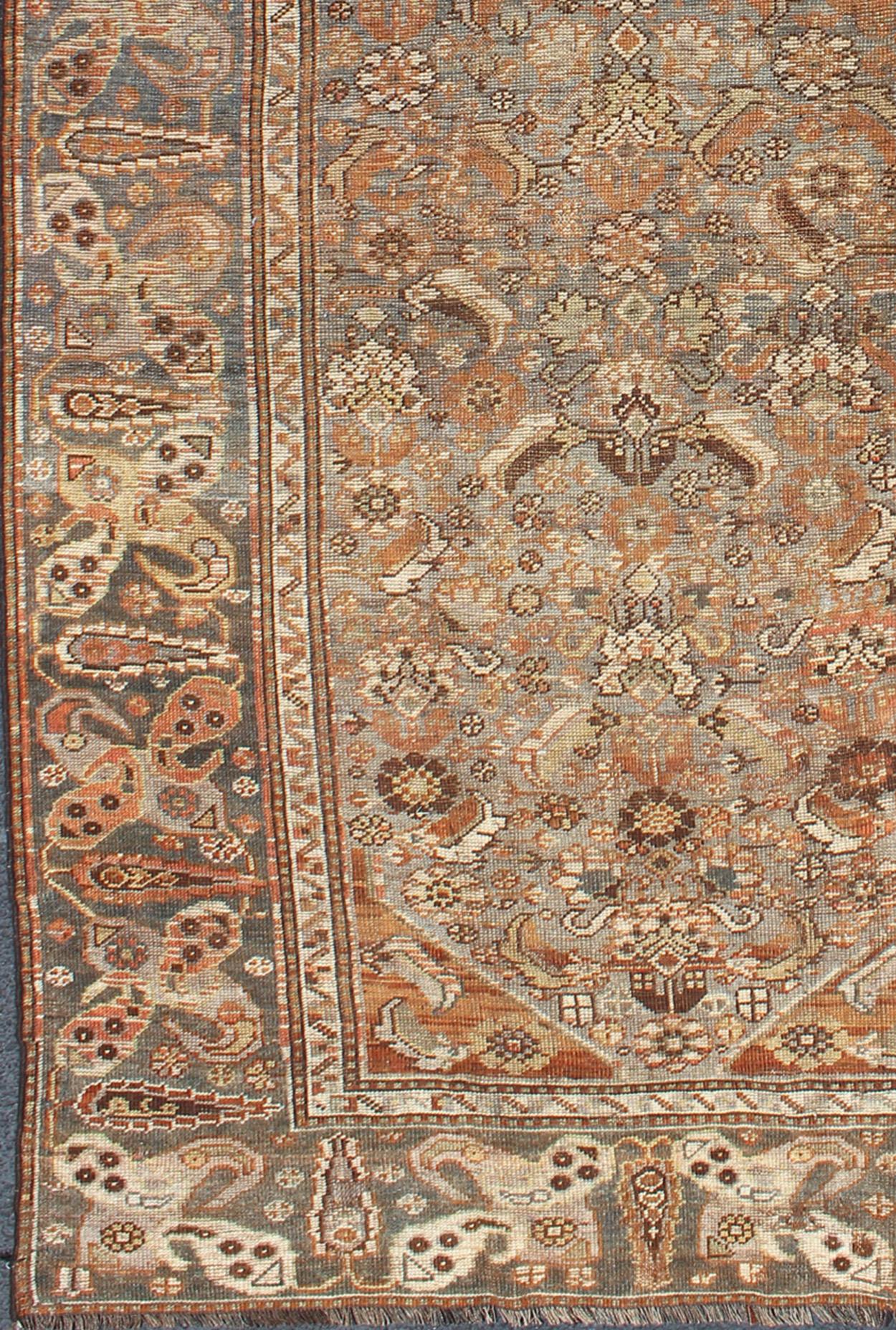 Qashqai Persian antique carpet in natural color tones with stylized sub-geometric design, rug ema-7560, country of origin / type: Iran / Qashqai, circa 1910.

The Qashqai nomads are found in the Fars province in southwest Iran. They move twice a