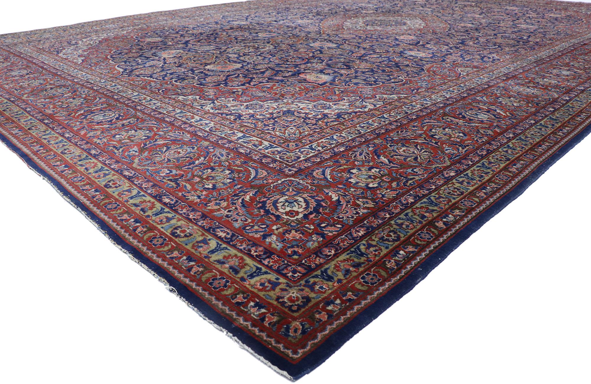 77866 antique Persian Qazvin rug with Victorian style 12'02 x 19'00. Ravishing and vibrant this hand knotted wool antique Persian Mashhad area rug features an elaborate concentric palmette medallion anchored with palmette pendants at either end