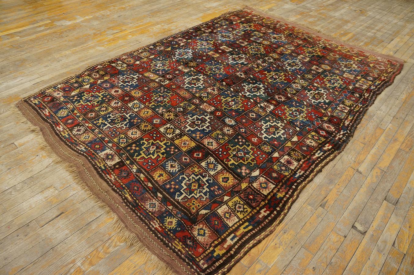 Antique Persian Quchan rug, size:5' 4'' x 7' 8''.
