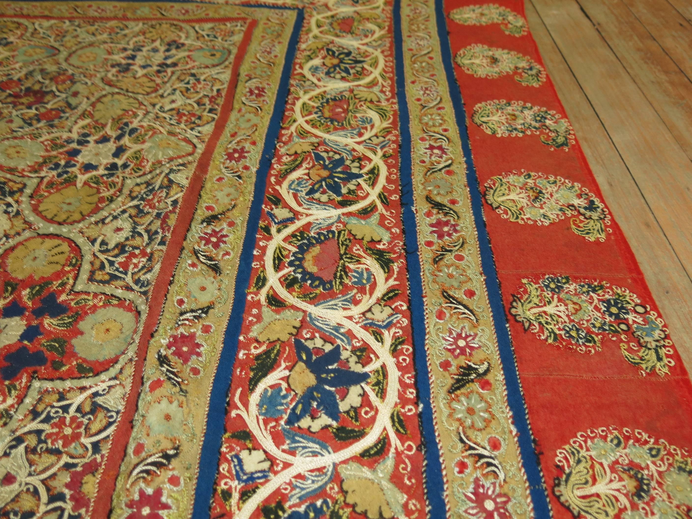 Hand-embroidered Chain stitched persian textile made in the middle of the 20th century. Silk elements found in the design with glowing vibrant colors executed by the weaver. Measures: 4'7