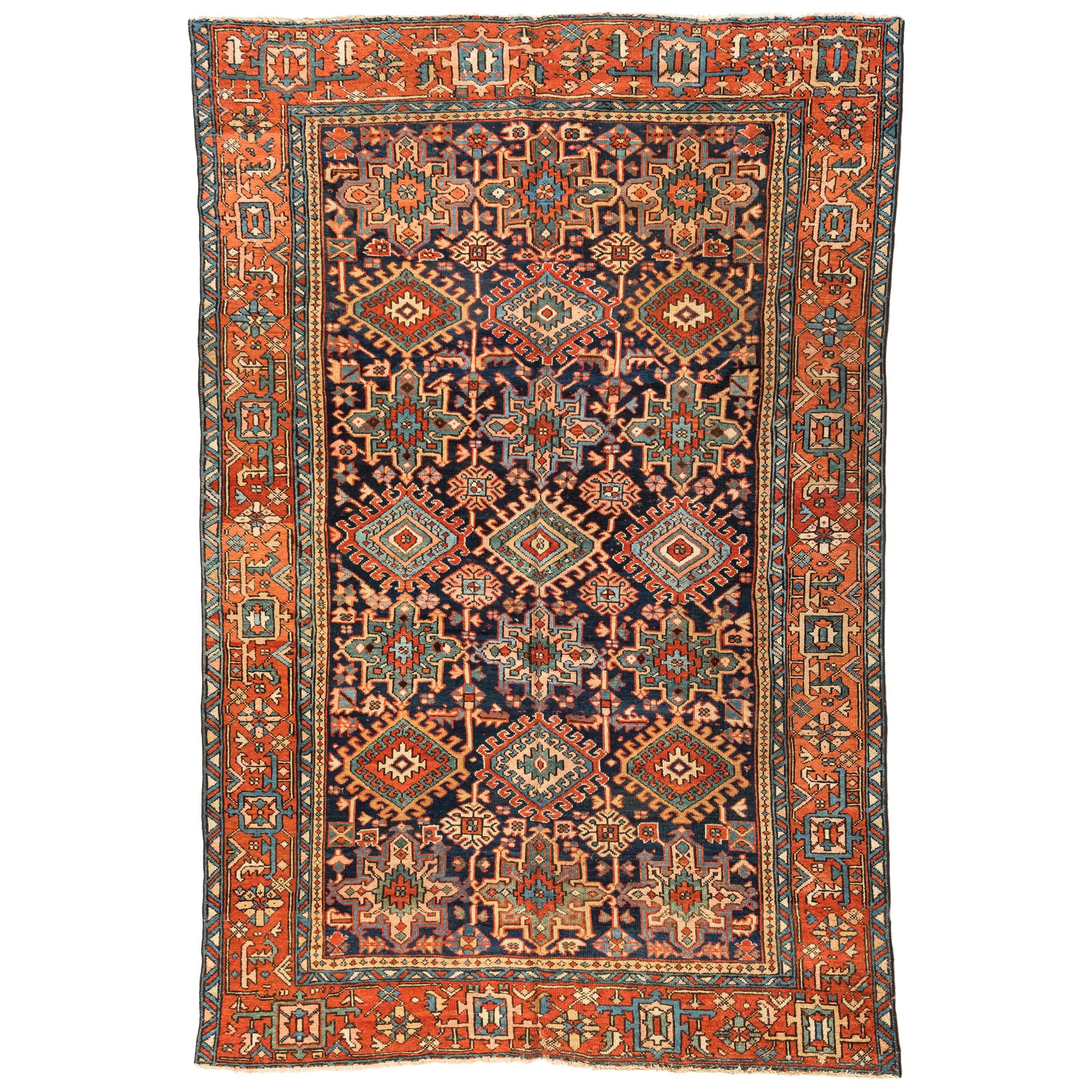 Tapis persan ancien Karaja géométrique rouge, vert et bleu marine