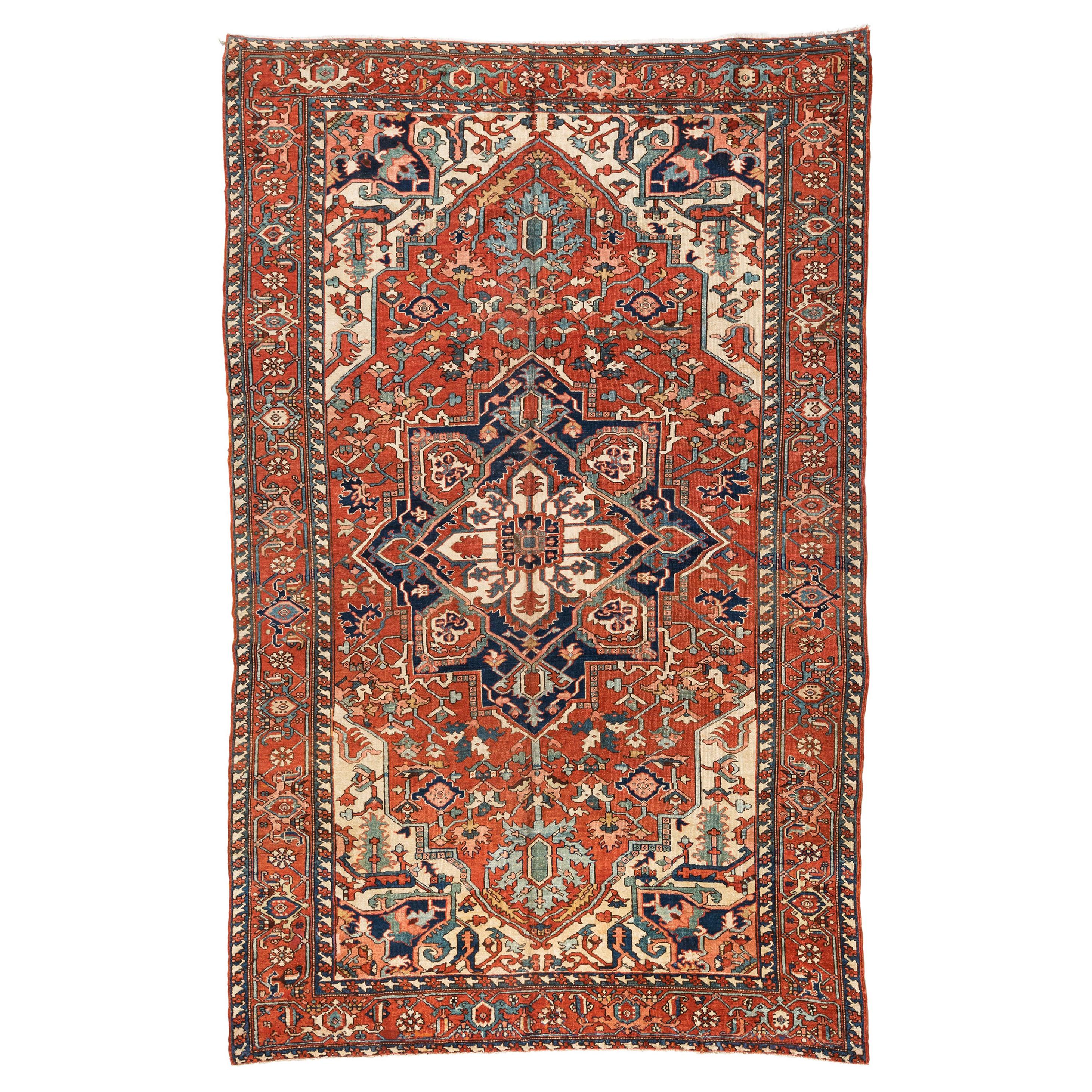 Antigua alfombra persa roja marfil y azul Serapi, circa 1920-1930