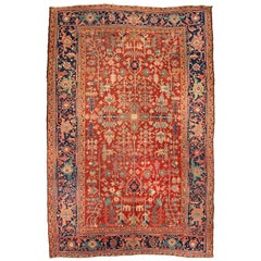 Antique Persian Red Navy Blue and Gold Geometric Heriz Rug, circa 1920s-1930s