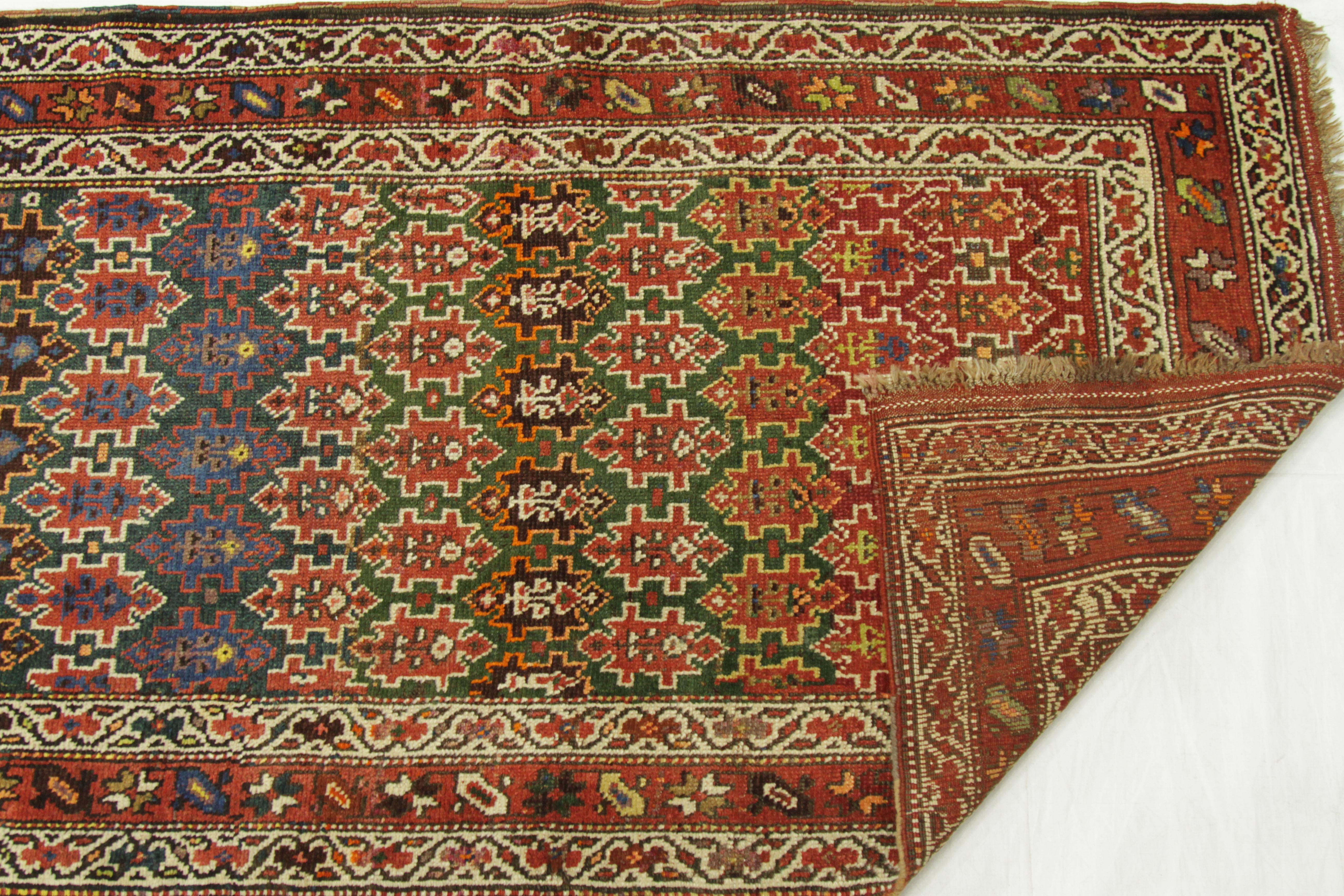 Antique Persian Rug Azerbaijan Design with Vibrant Tribal Patterns, circa 1920s In Excellent Condition For Sale In Dallas, TX