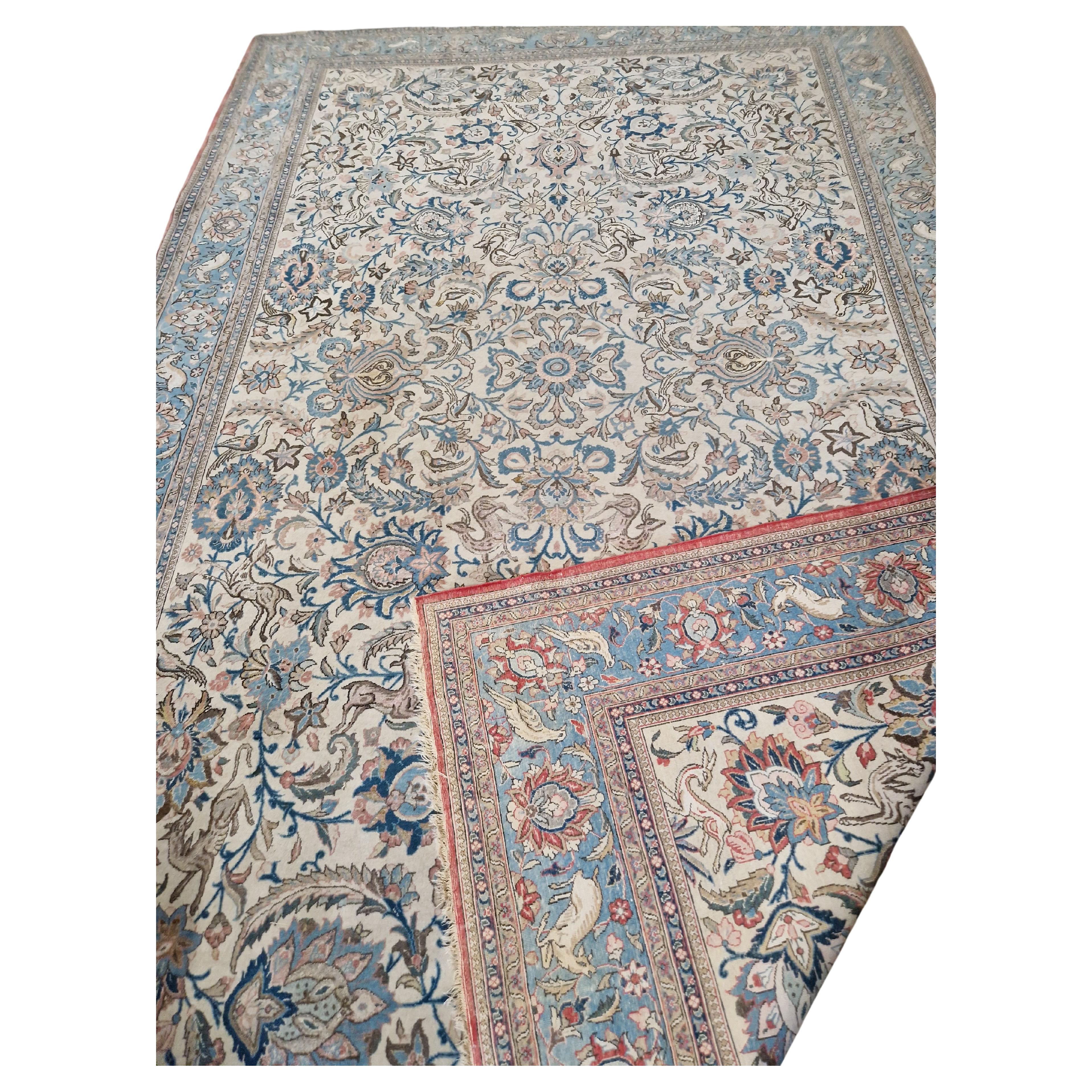 Add a touch of elegance to any room with this unique antique Persian rug from the city of GHOM Measuring 355 x 232 cm, this hand-hooked rug features a rectangular shape and a stunning multicoloured design that is sure to impress. The rug is made