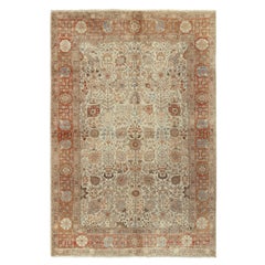 Tapis persan ancien en tout blanc cassé orange avec motif floral par Rug & Kilim