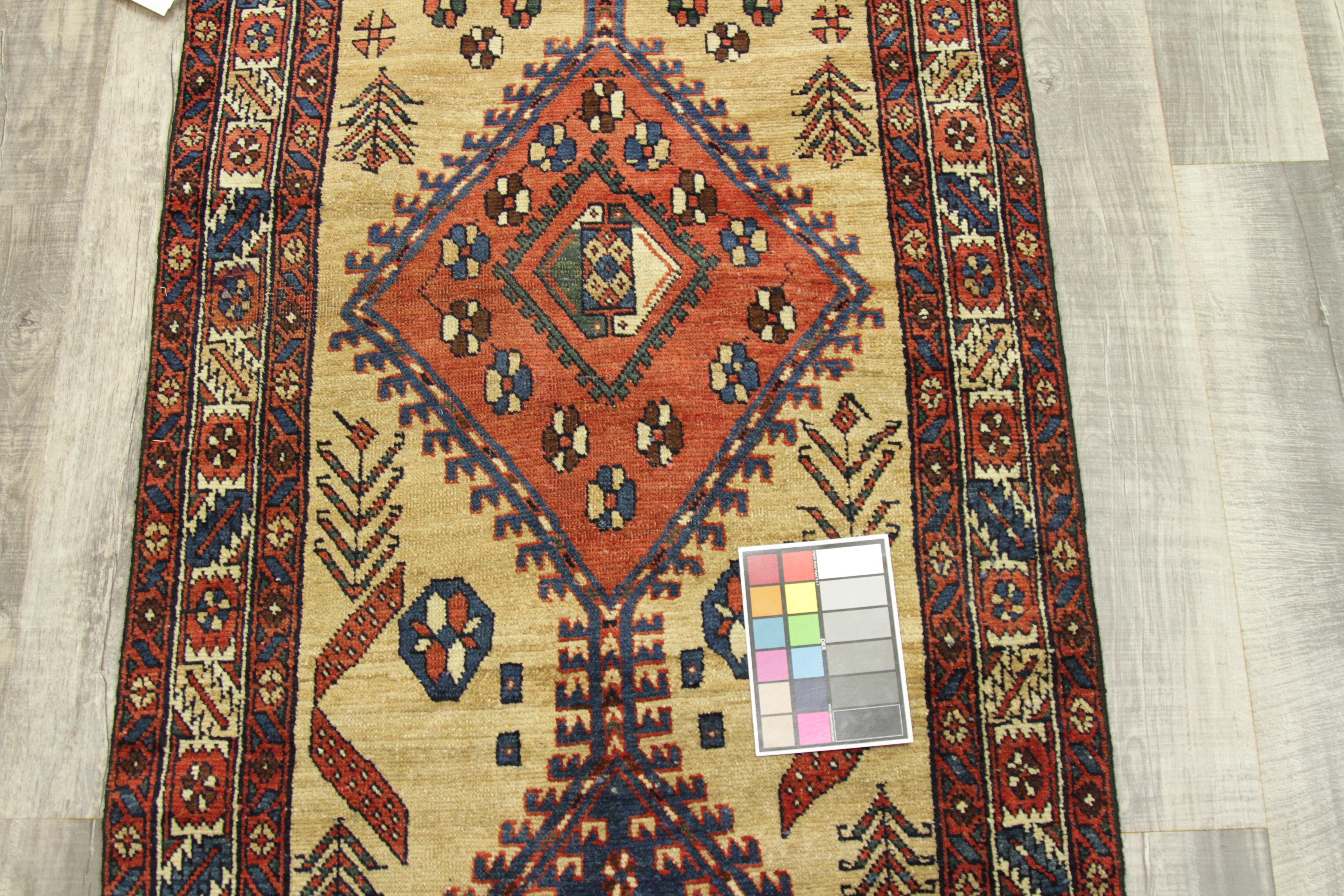 Wool Antique Persian Rug in Azerbaijan Design with Fine Camel Hair Backing For Sale