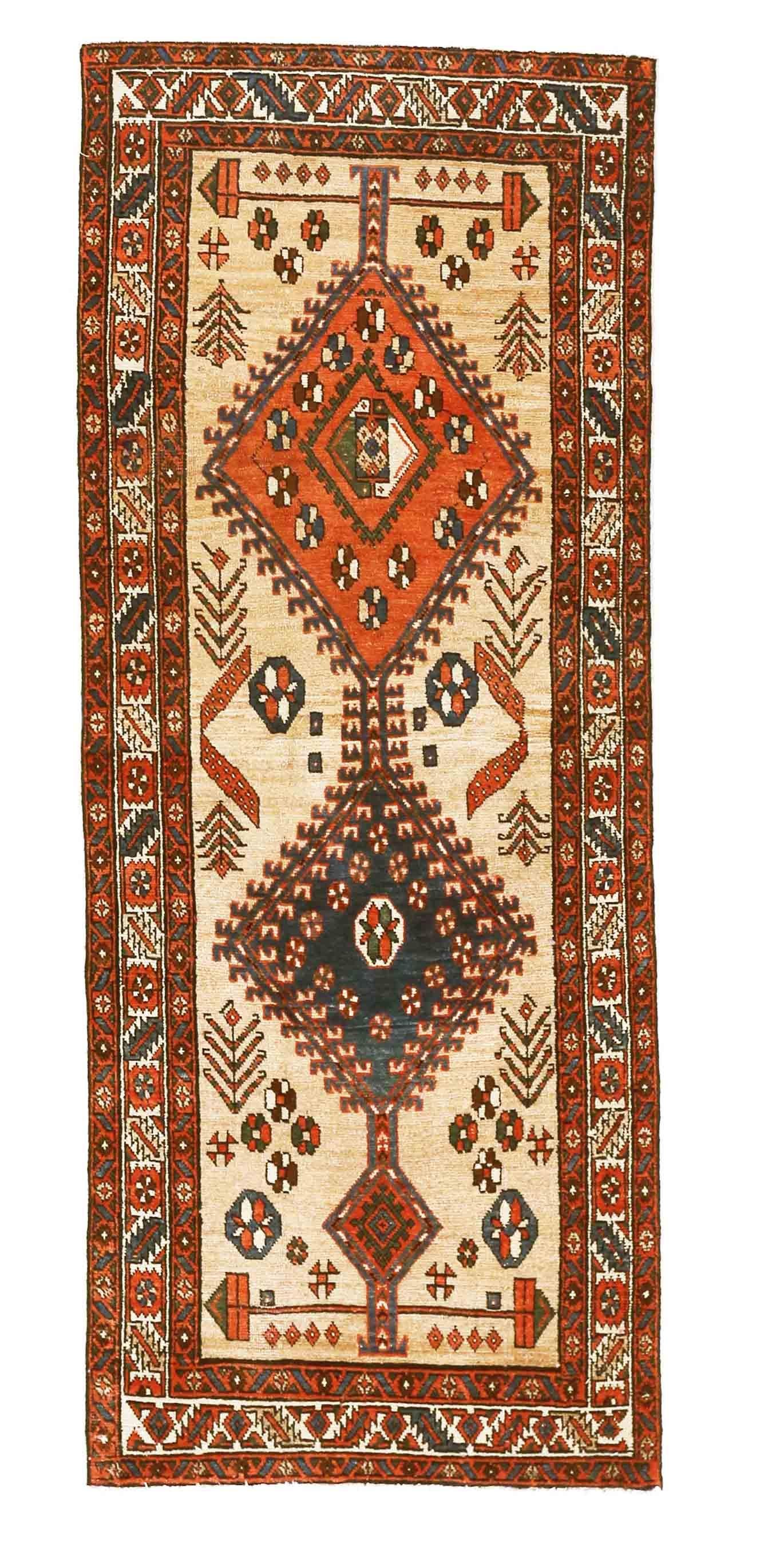 One-of-a-kind antique Persian rug inspired by Azerbaijan design patterns. The fine details are highlighted by the exquisite camel hair backing which perfectly blends all the colors of the carpet. The antique Persian rug has a 2’9” x 6”7” dimension