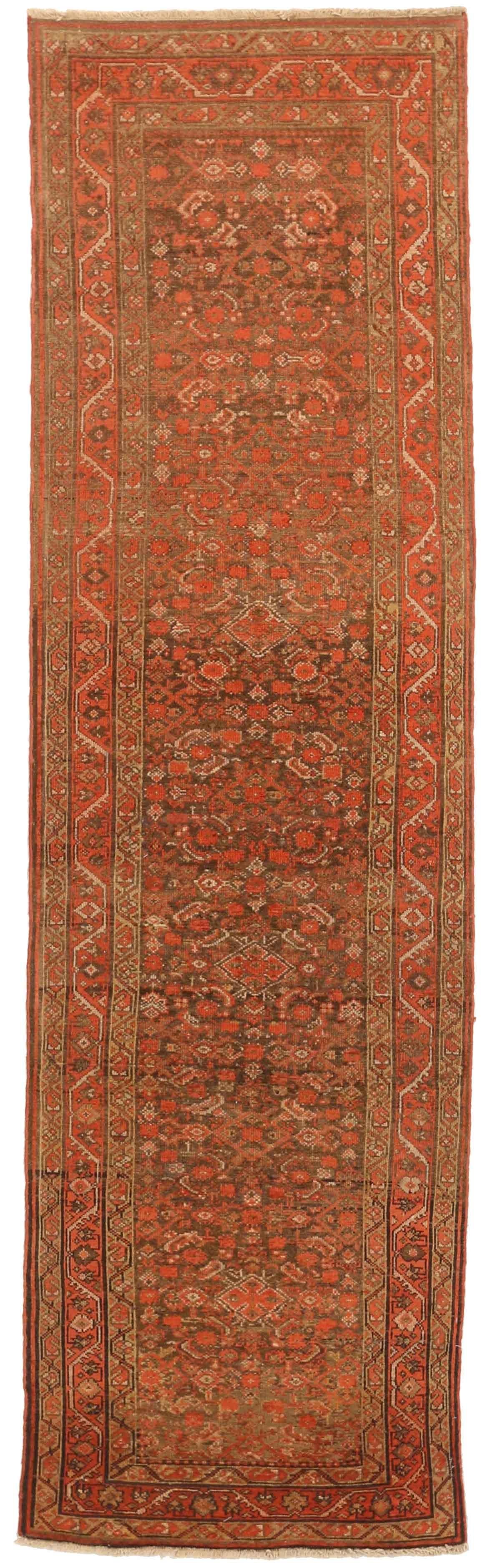 Handwoven antique Persian rug made in the 1910s using Malayer design patterns. It's a deep brown and red color motif is a bold but beautiful choice for traditional and midcentury home interior themes. This antique Persian rug has a 2’6” x 9’4”
