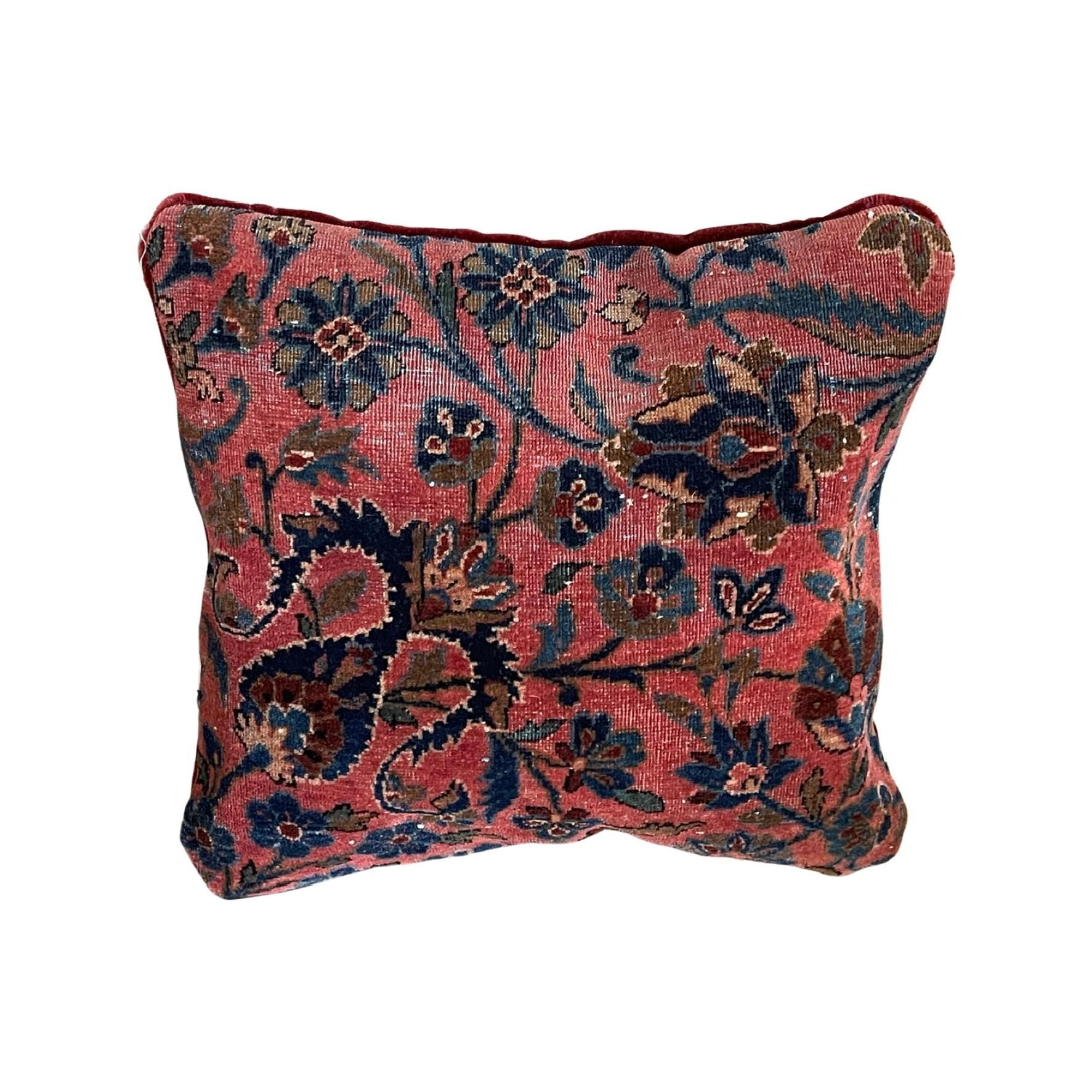 Bring charm of an antique rug into areas other than your floor! This pillow which was made using an antique Persian rug from the early 1900’s comes stuffed with cotton filling and backing is as shown in the pictures with an accessible zipper to