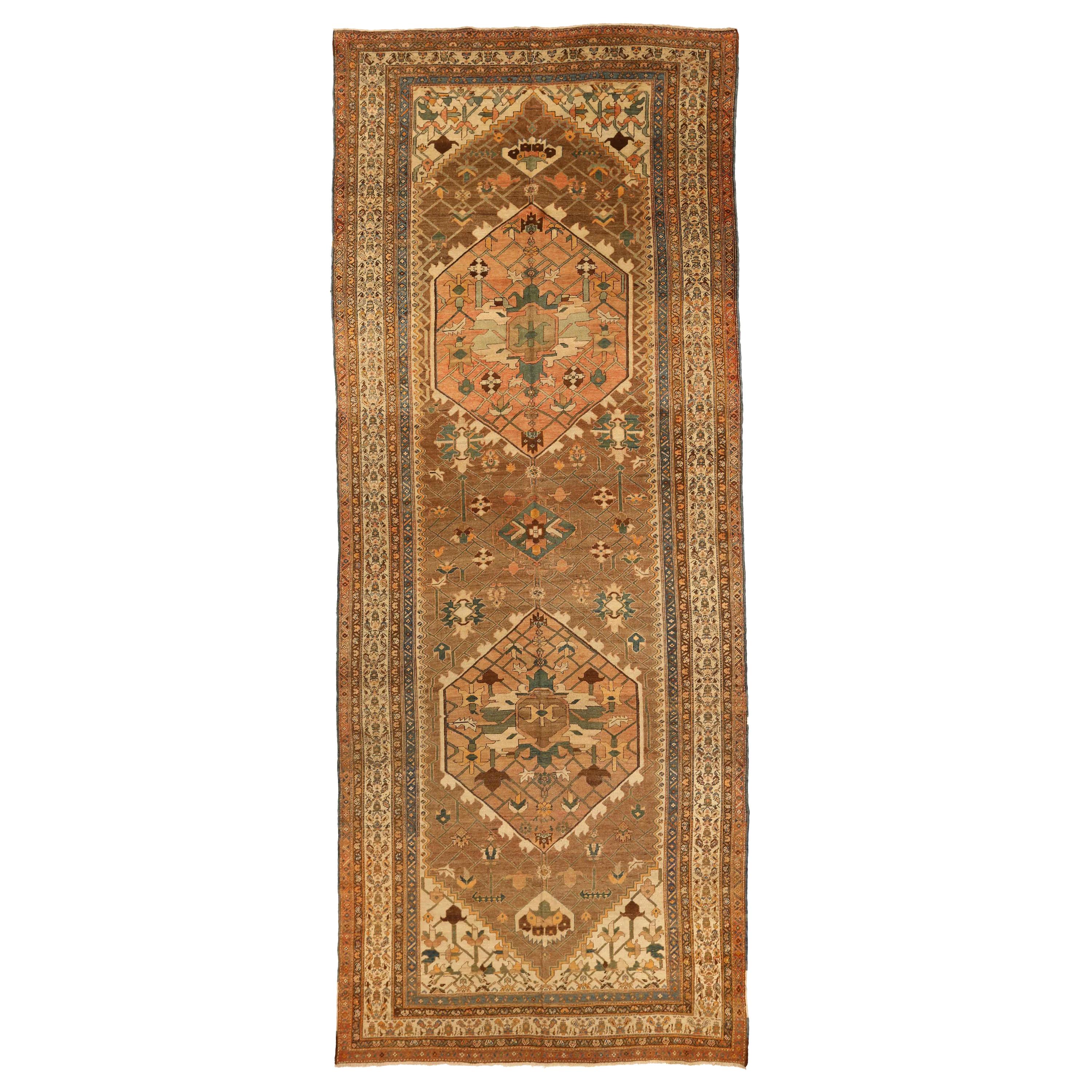 Antique Persian Rug Serapi Design in Green and Brown Tribal Details, circa 1920s For Sale