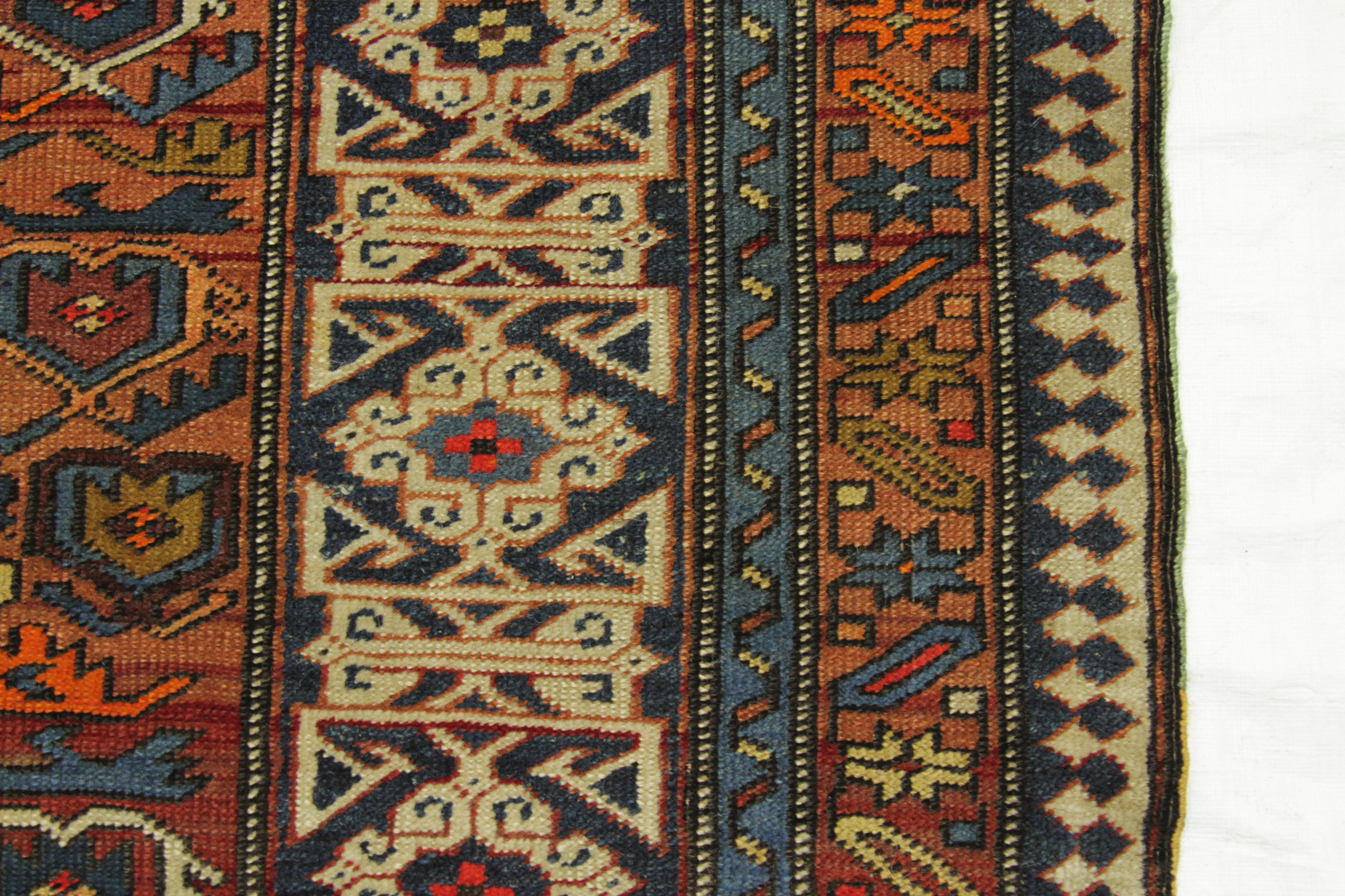 Wool Antique Persian Rug Shirvan Design with Dainty Heart-Shaped Patterns, circa 1930 For Sale