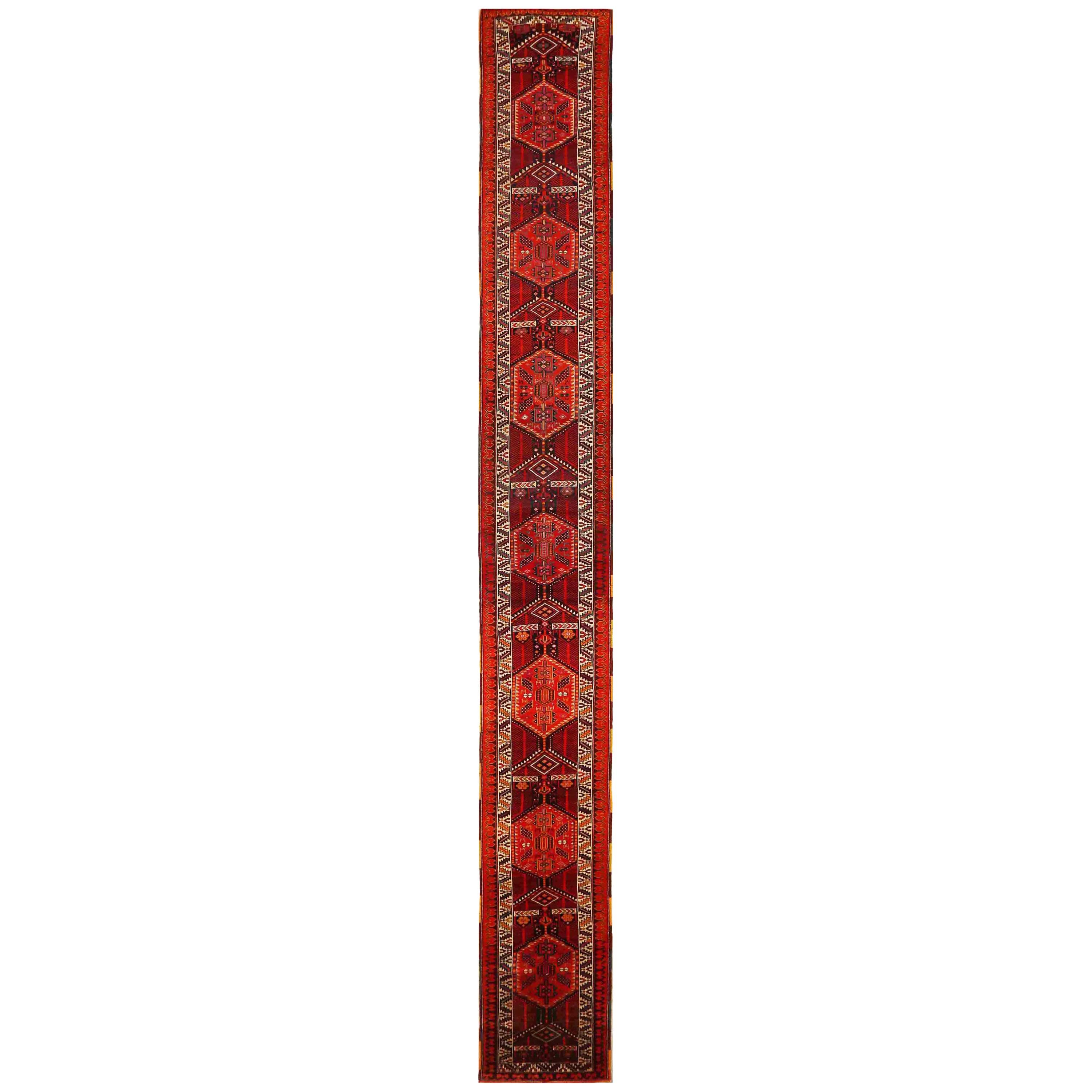 Antique Persian Rug with Tribal Design and Extraordinary Length, circa 1900s