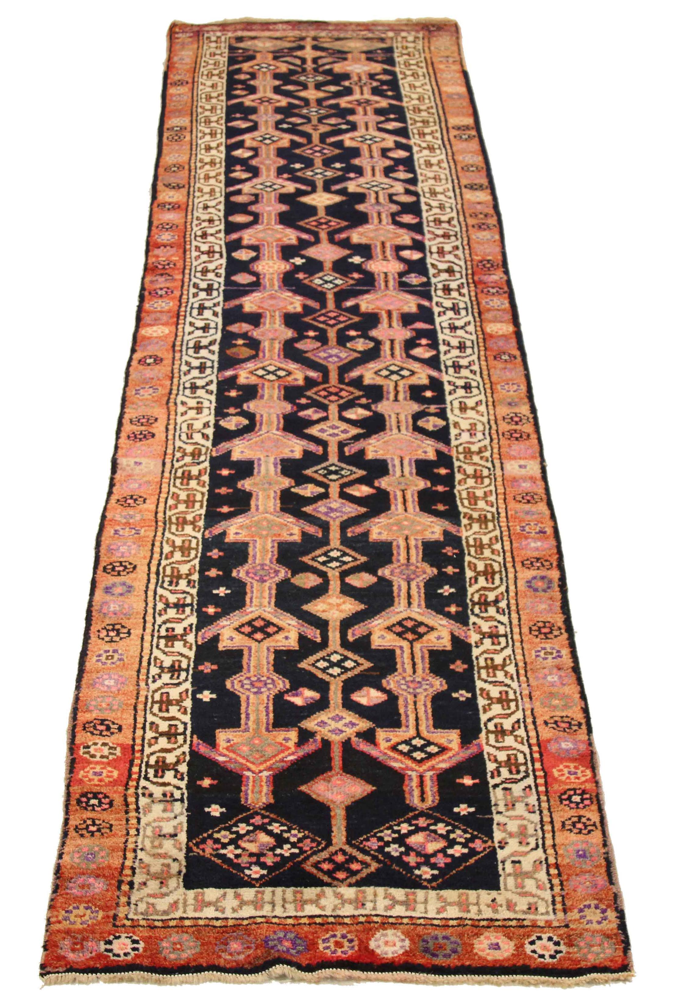 Antique Persian runner rug handwoven from the finest sheep’s wool. It’s colored with all-natural vegetable dyes that are safe for humans and pets. It’s a traditional Azarbaijan design handwoven by expert artisans. It’s a lovely runner rug that can