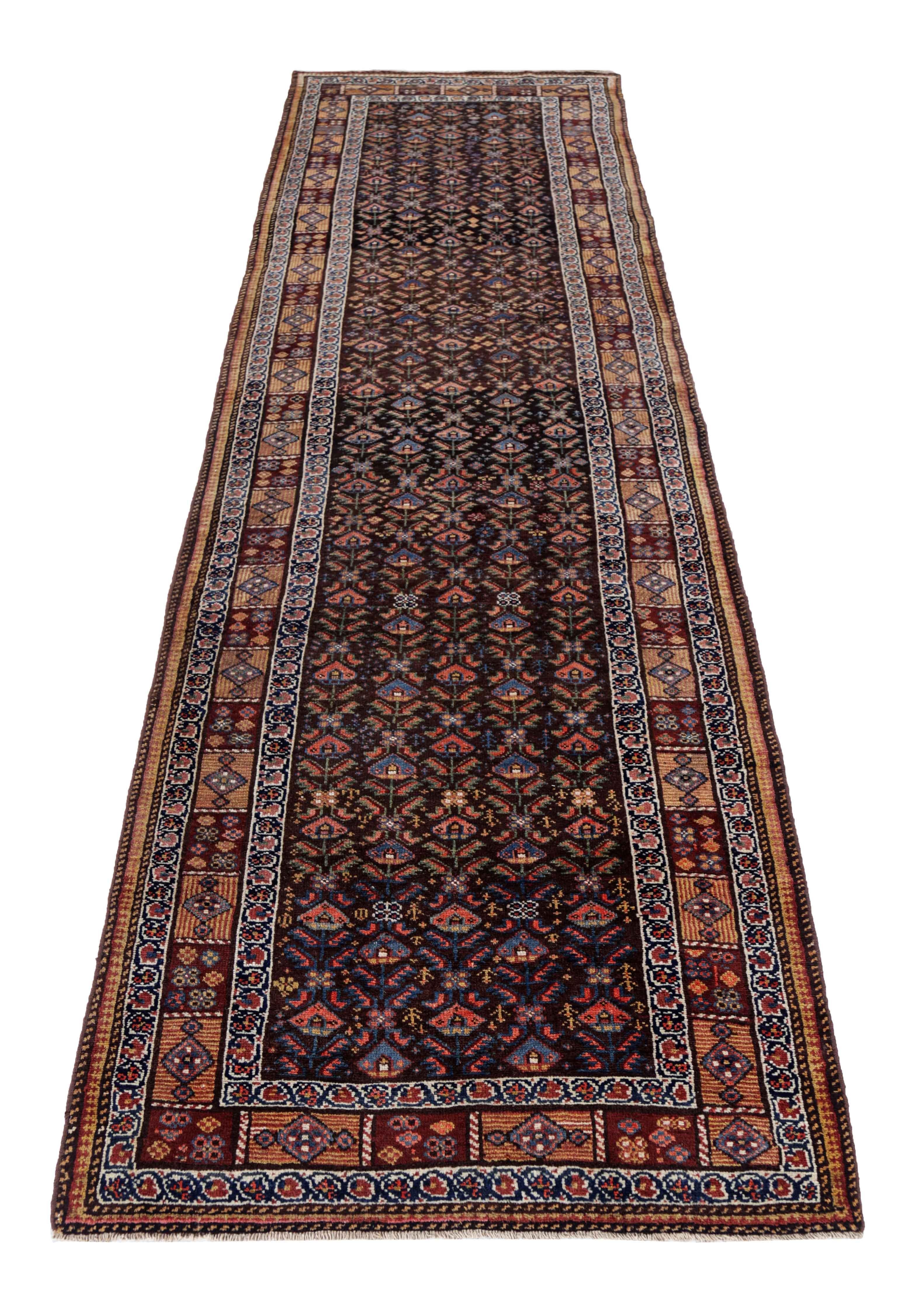 Antique Persian runner rug handwoven from the finest sheep’s wool. It’s colored with all-natural vegetable dyes that are safe for humans and pets. It’s a traditional Bijar design handwoven by expert artisans. It’s a lovely runner rug that can be