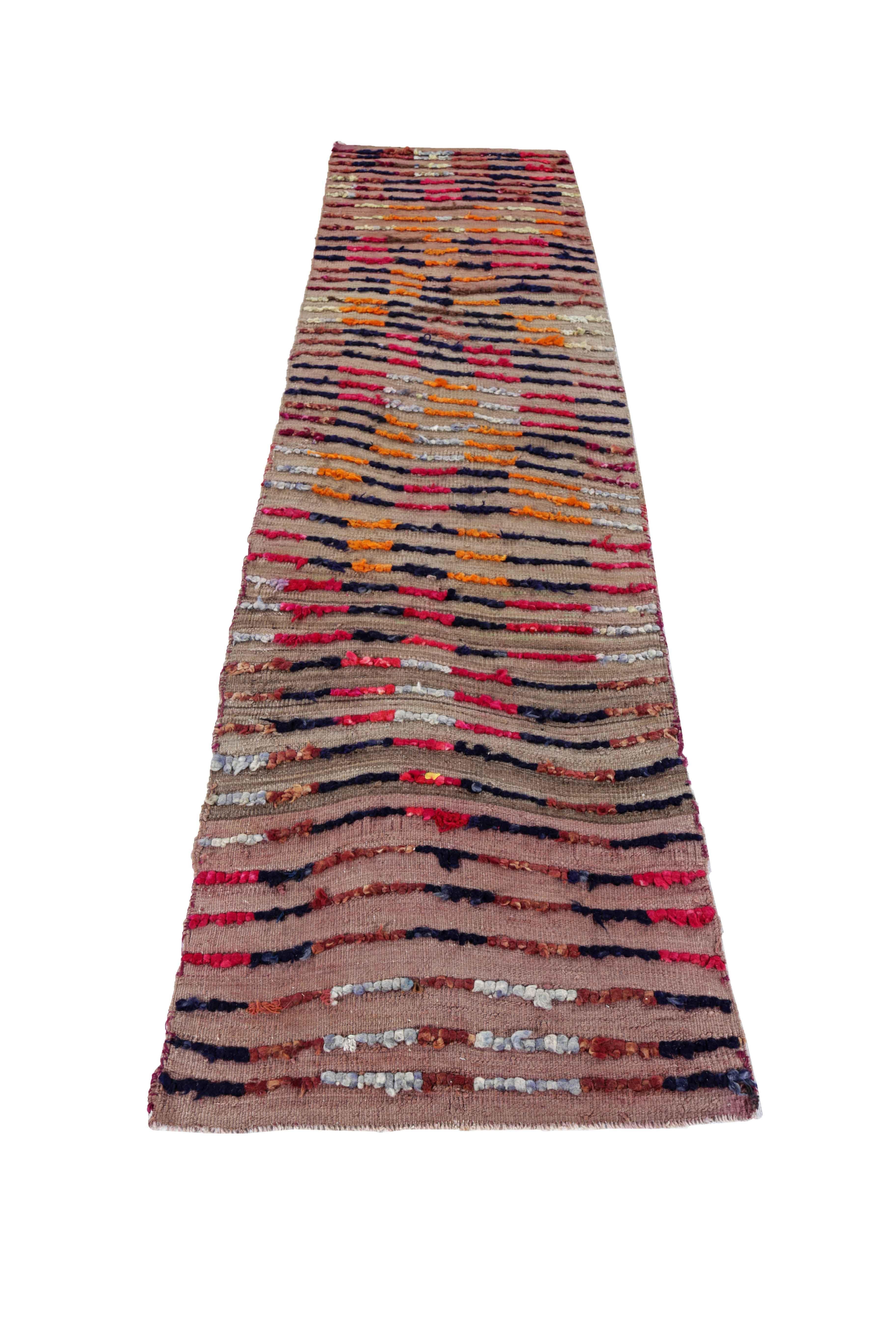 Antique Persian runner rug handwoven from the finest sheep’s wool. It’s colored with all-natural vegetable dyes that are safe for humans and pets. It’s a traditional Gabbeh design handwoven by expert artisans. It’s a lovely runner rug that can be