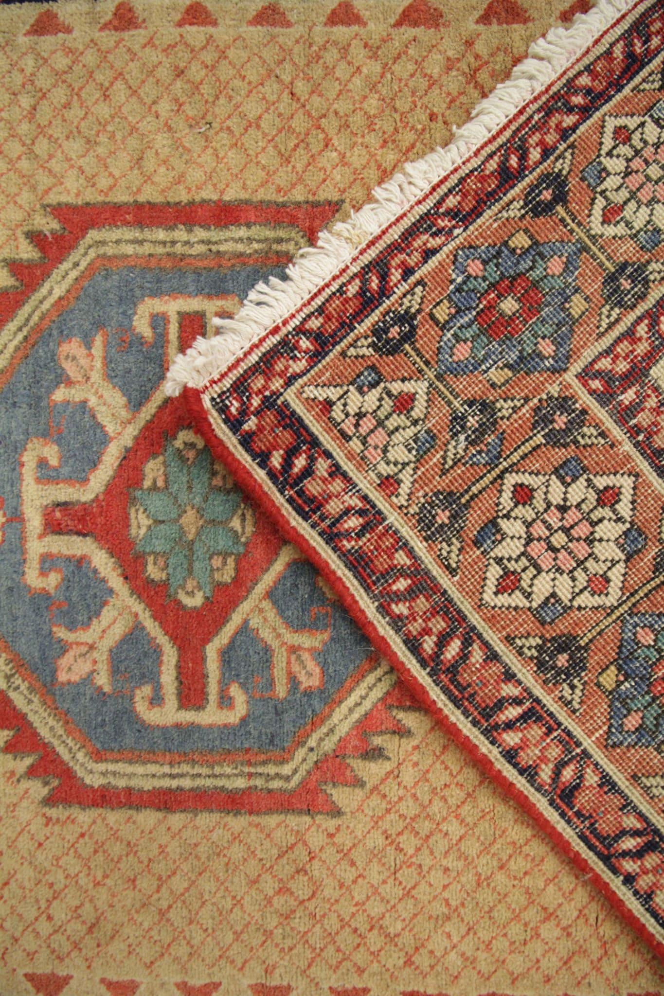 This antique runner rug is a true masterpiece, boasting exquisite craftsmanship and rich history. Hand-knotted with precision, this stair runner area rug carries the charm of the 1930s, making it a prized possession for any collector. Its excellent