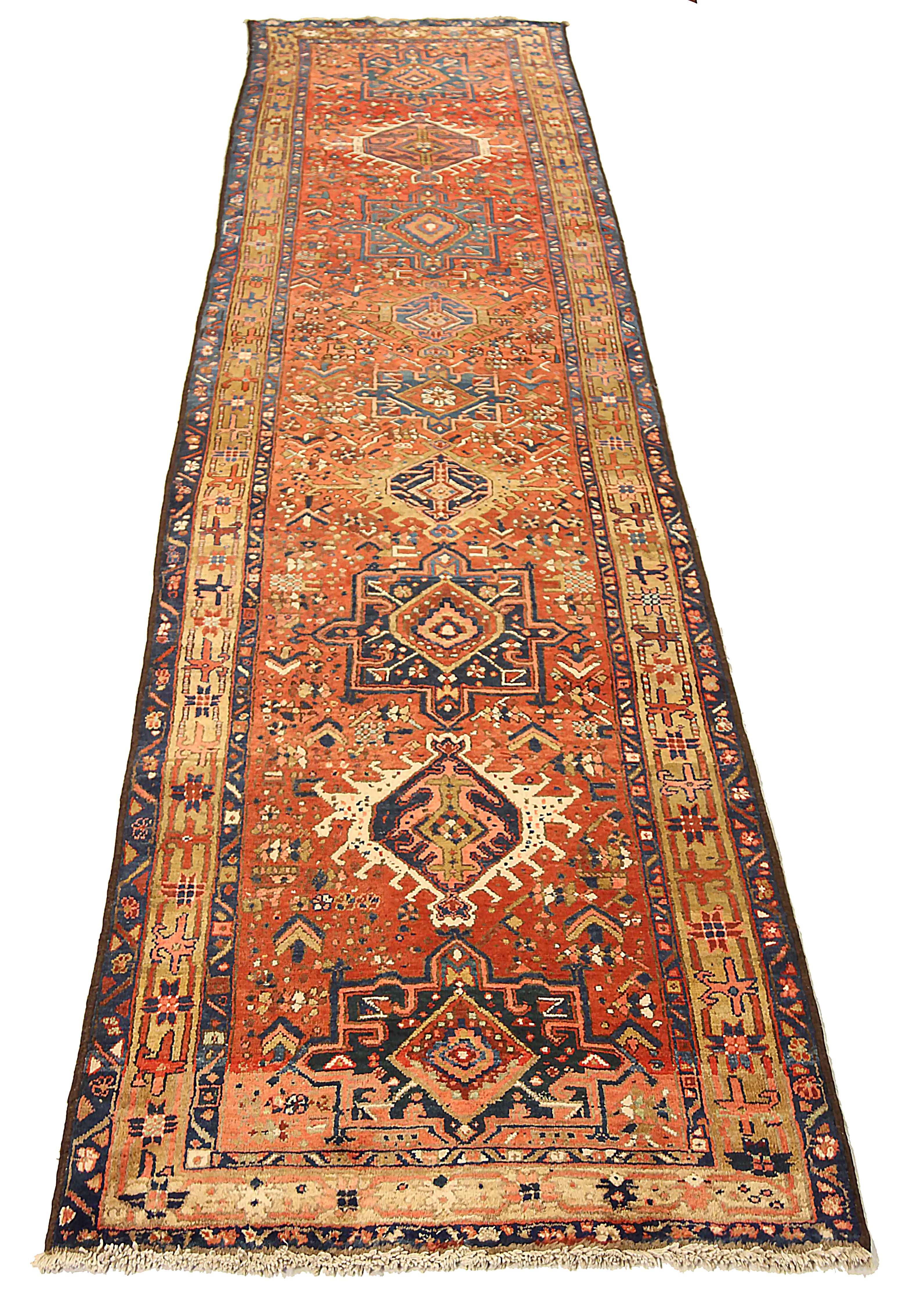 Antique Persian runner rug handwoven from the finest sheep’s wool. It’s colored with all-natural vegetable dyes that are safe for humans and pets. It’s a traditional Karajeh design handwoven by expert artisans. It’s a lovely runner rug that can be