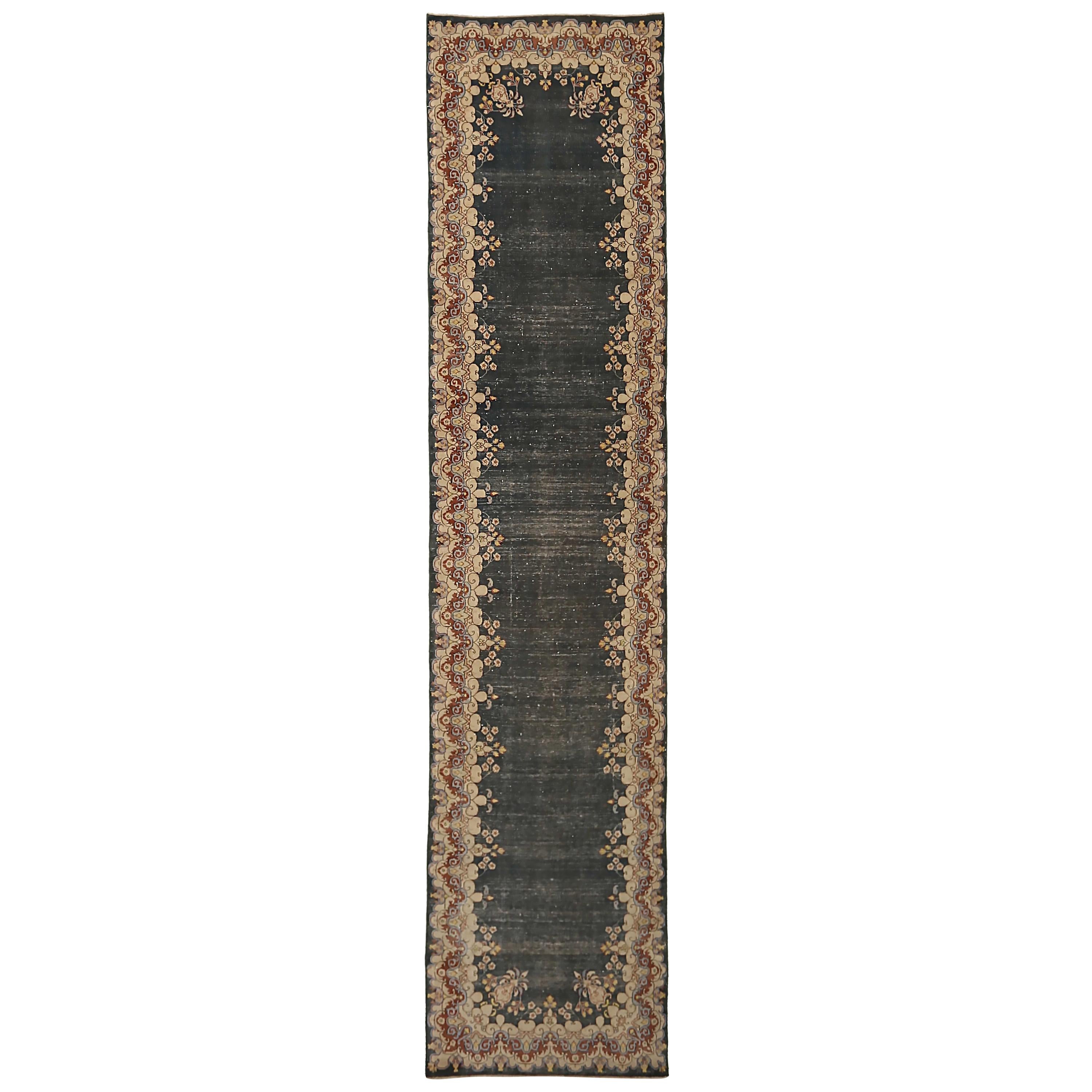 Antique Persian runner rug handwoven from the finest sheep’s wool. It’s colored with all-natural vegetable dyes that are safe for humans and pets. It’s a traditional Kerman design handwoven by expert artisans. It’s a lovely runner rug that can be