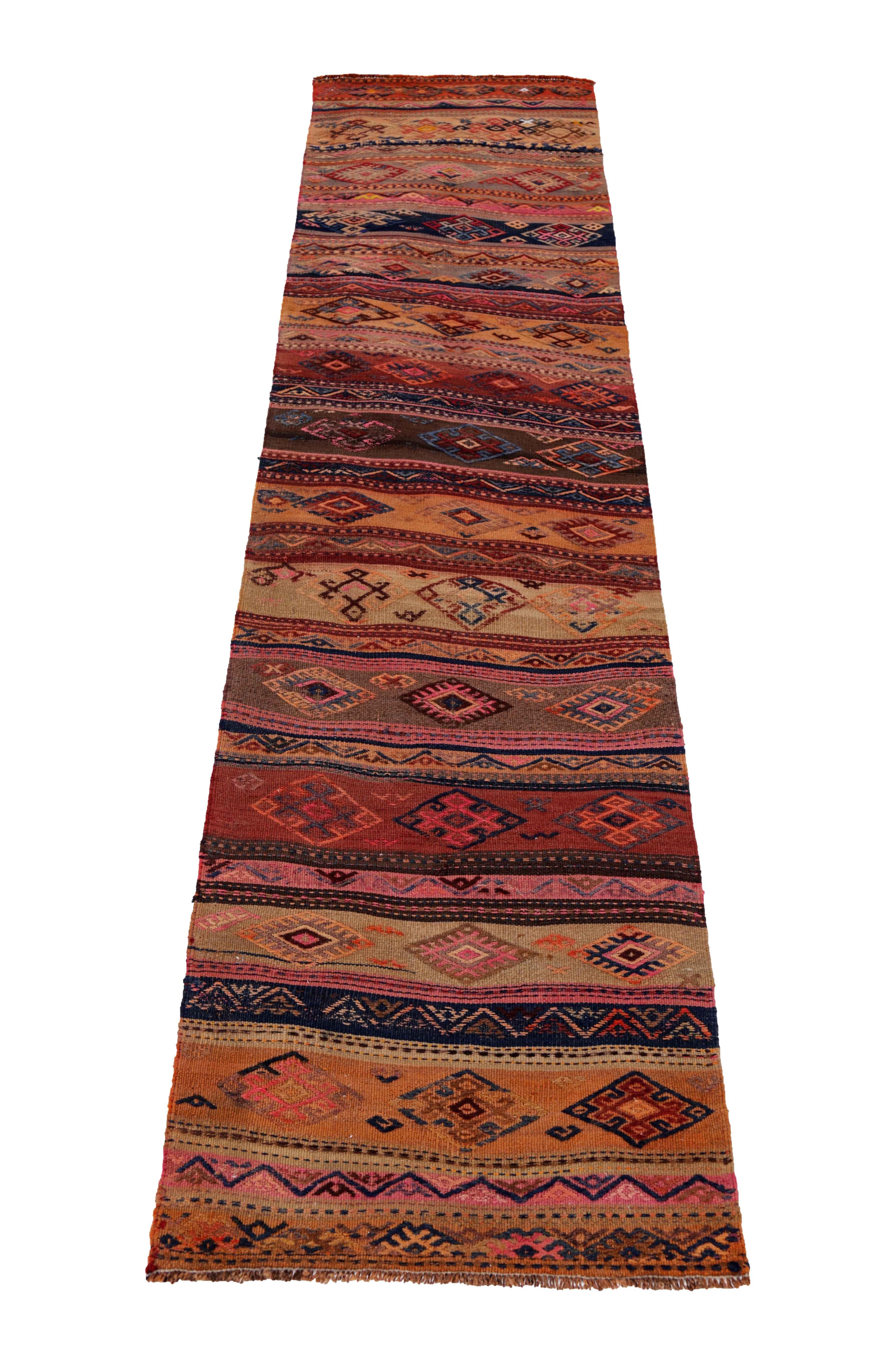 Antique Persian runner rug handwoven from the finest sheep’s wool. It’s colored with all-natural vegetable dyes that are safe for humans and pets. It’s a traditional Kilim design handwoven by expert artisans. It’s a lovely runner rug that can be